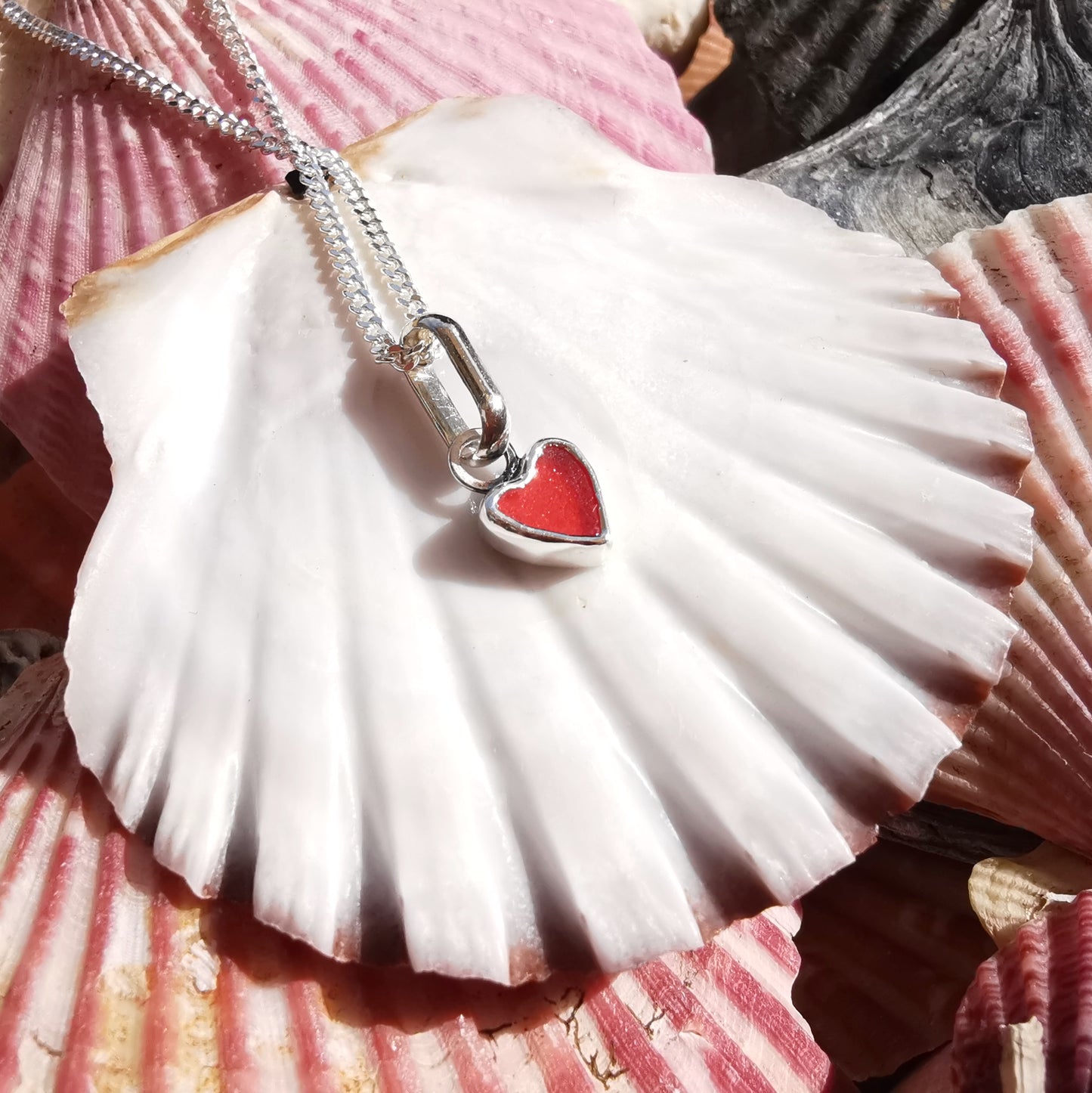 Tiny Scottish red sea glass heart & sterling silver pendant.
