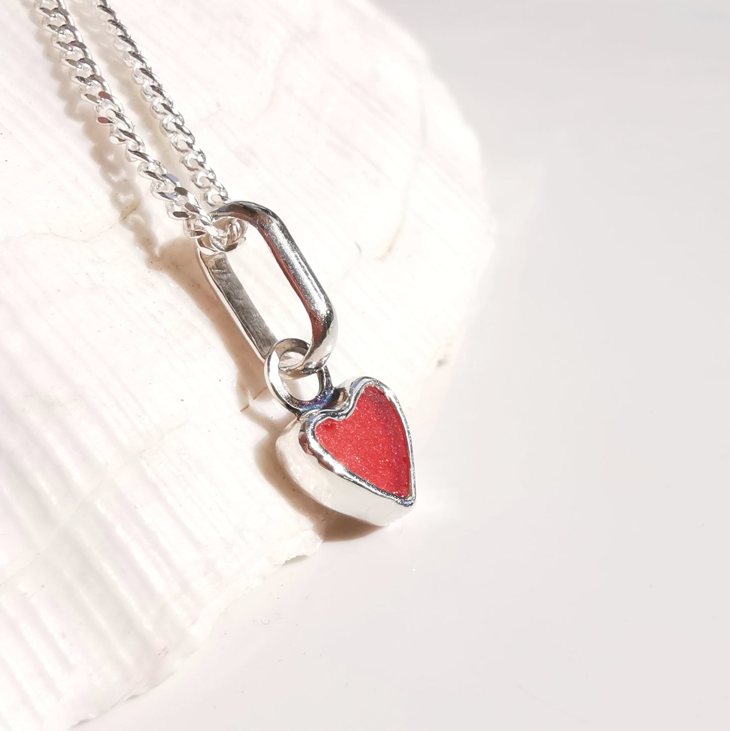 Tiny Scottish red sea glass heart & sterling silver pendant.