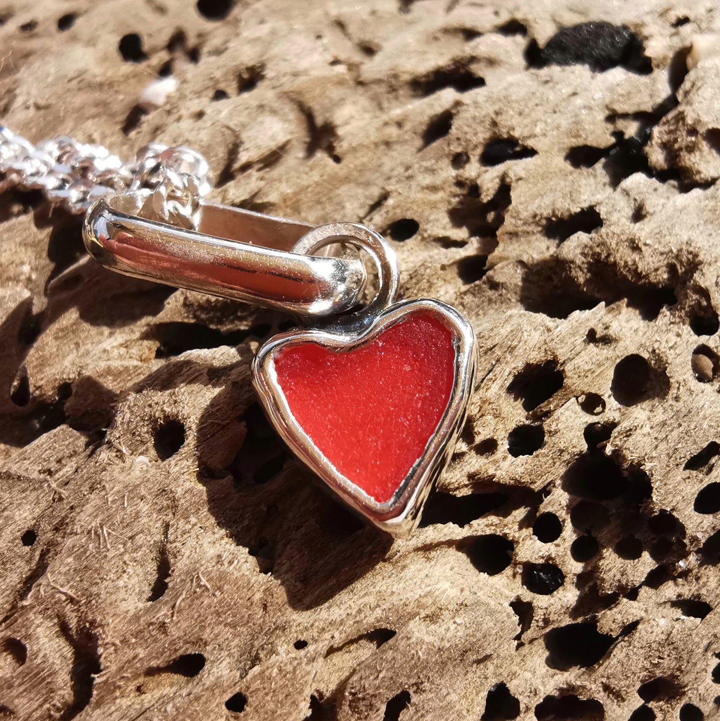Tiny Scottish red sea glass heart & sterling silver pendant.