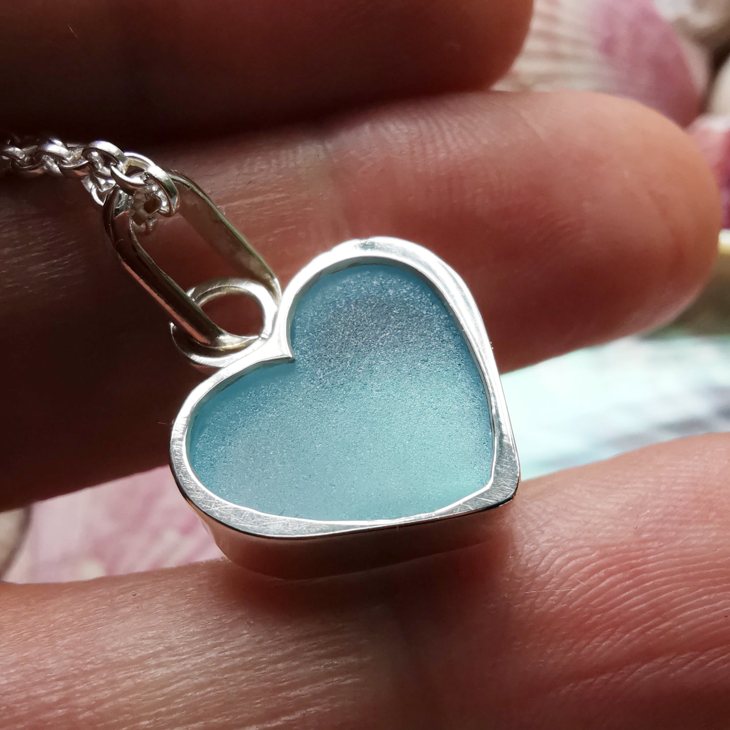 Light aquamarine blue sea glass heart & sterling silver pendant.