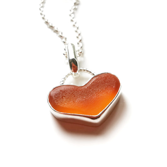 Scottish orange UV sea glass heart & sterling silver pendant.