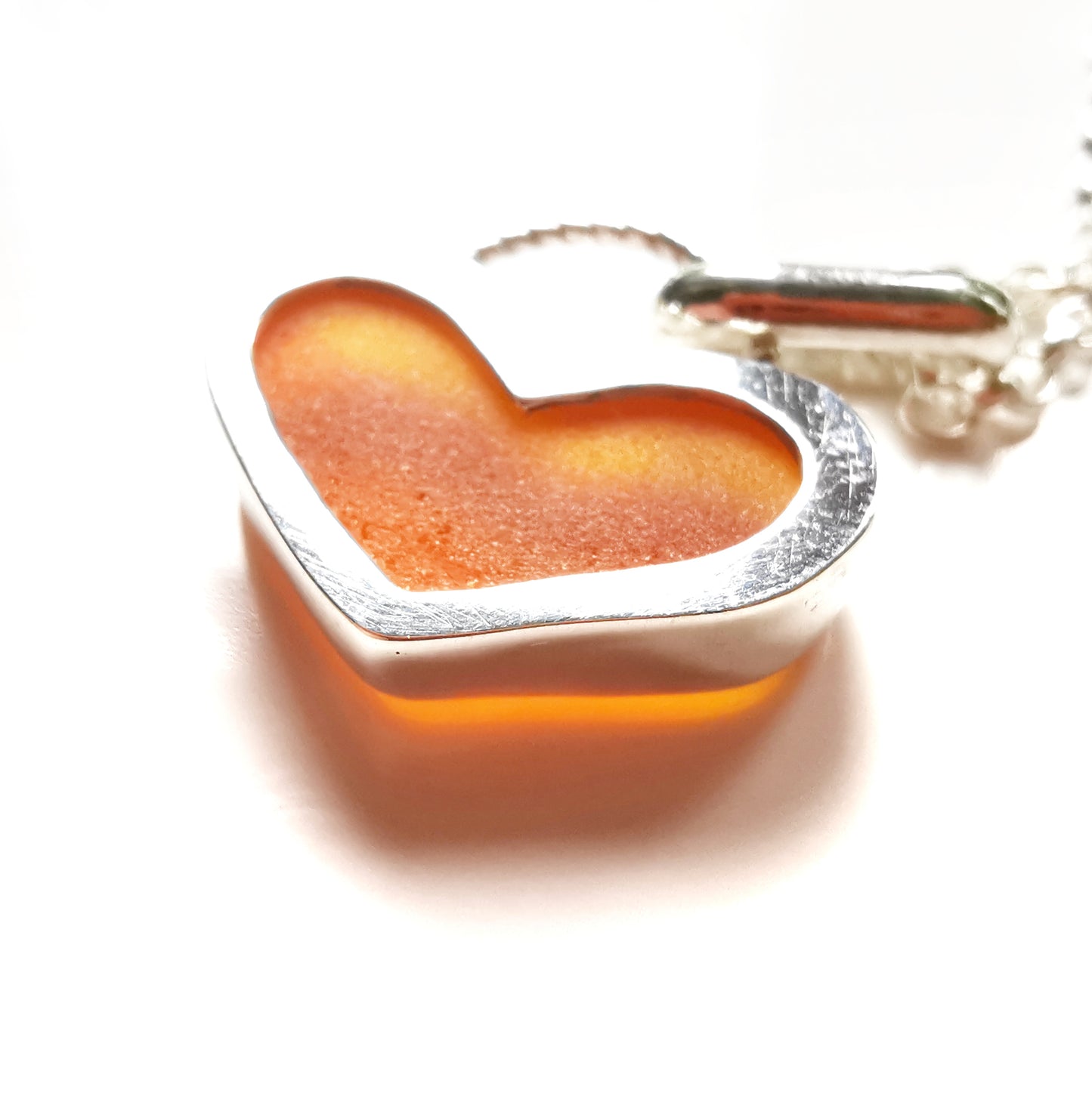 Scottish orange UV sea glass heart & sterling silver pendant.
