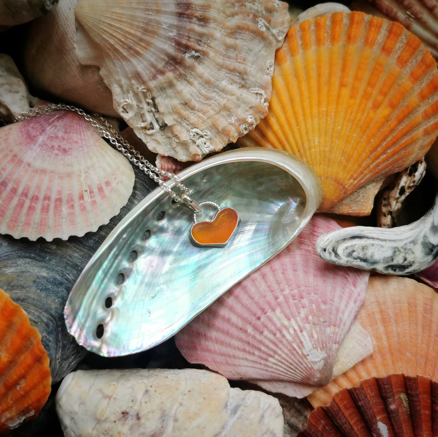 Scottish orange UV sea glass heart & sterling silver pendant.
