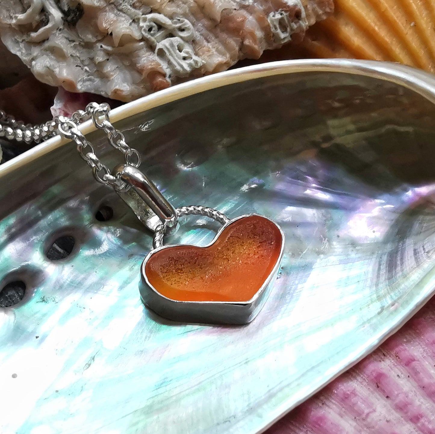 Scottish orange UV sea glass heart & sterling silver pendant.