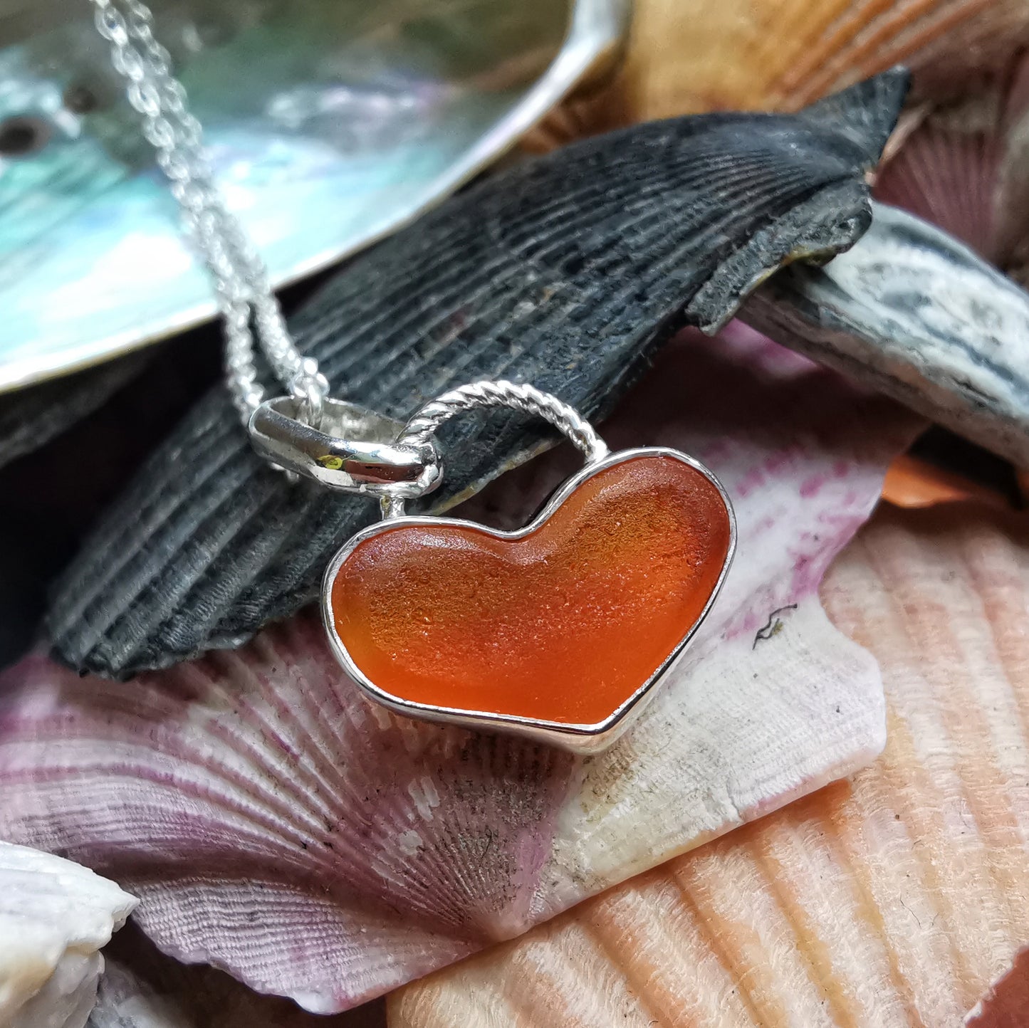 Scottish orange UV sea glass heart & sterling silver pendant.