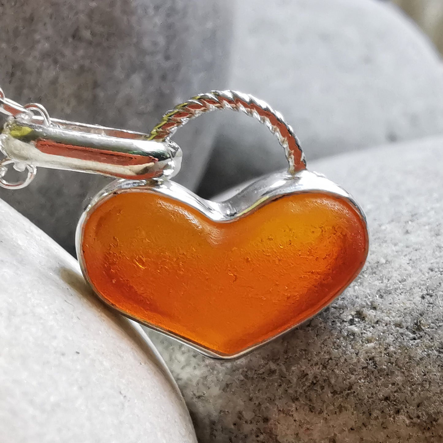 Scottish orange UV sea glass heart & sterling silver pendant.