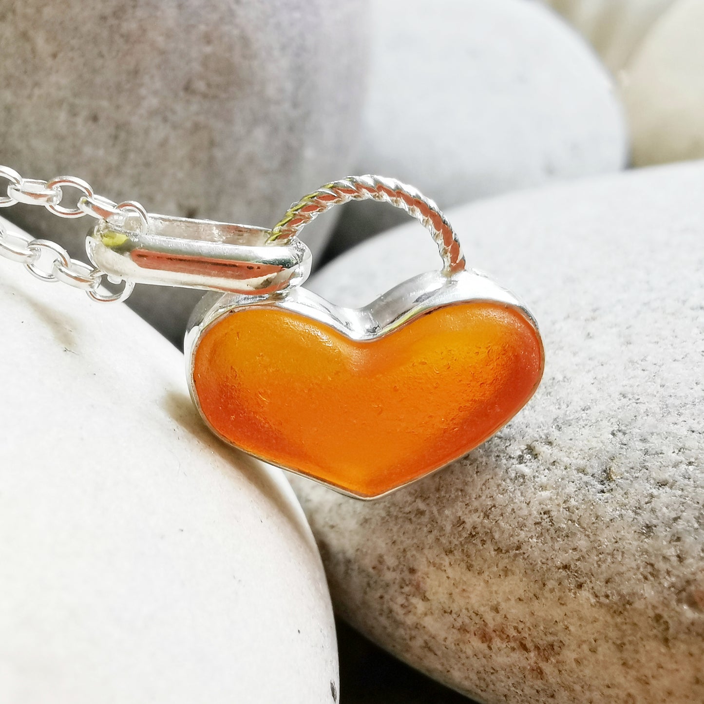 Scottish orange UV sea glass heart & sterling silver pendant.