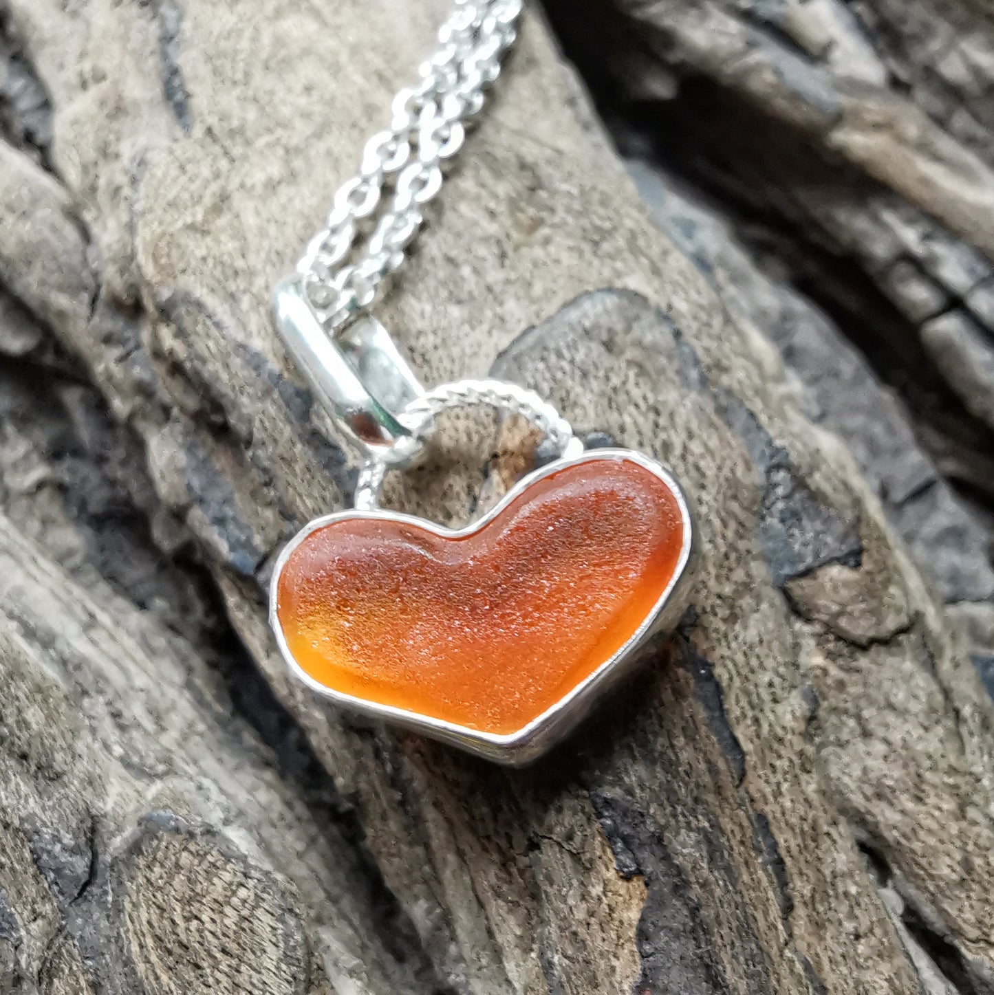 Scottish orange UV sea glass heart & sterling silver pendant.