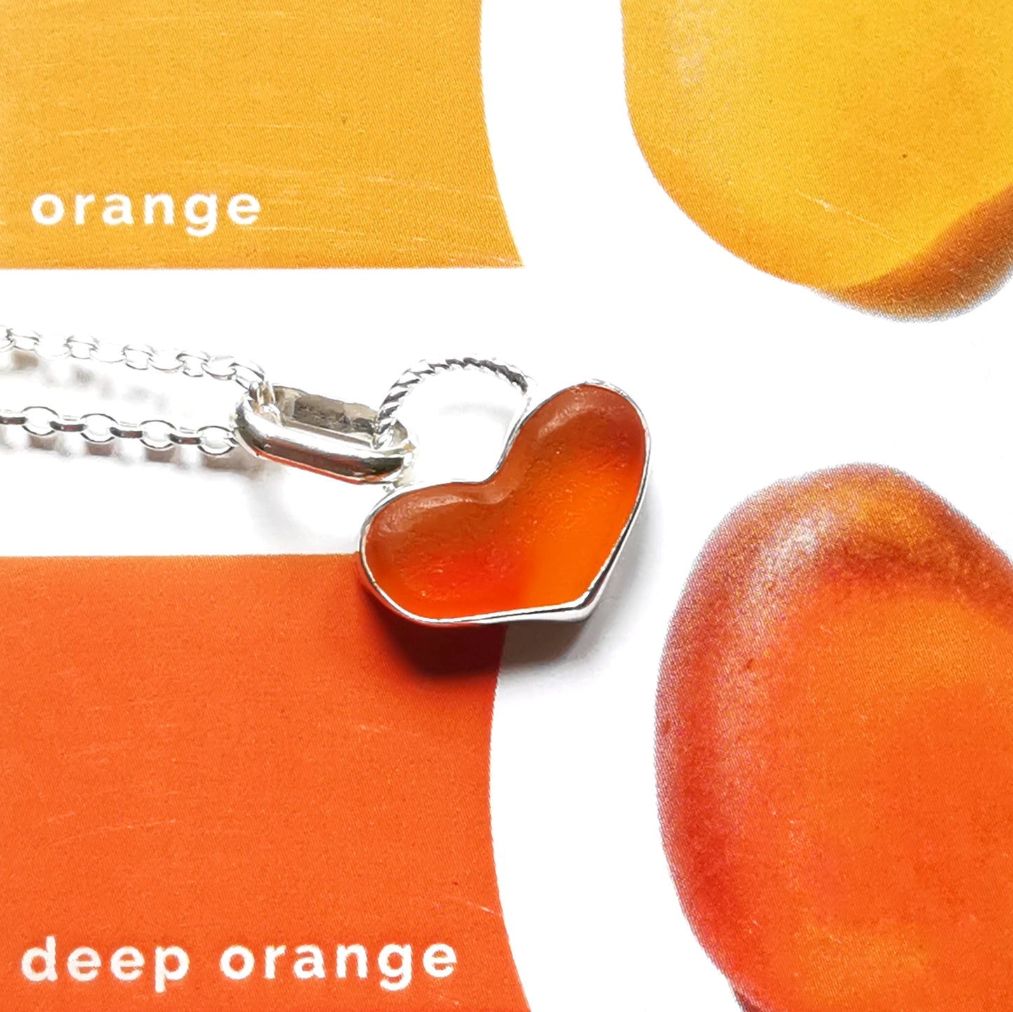 Scottish orange UV sea glass heart & sterling silver pendant.