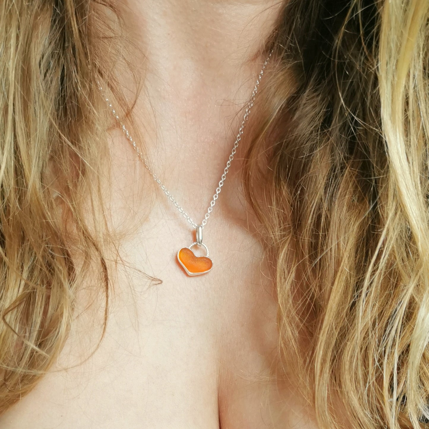 Scottish orange UV sea glass heart & sterling silver pendant.