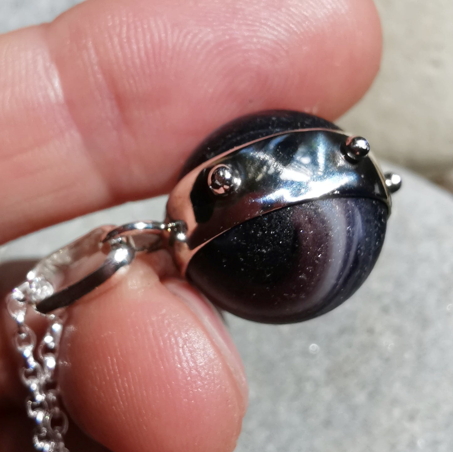 Genuine Scottish purple sea glass marble & sterling silver pendant.