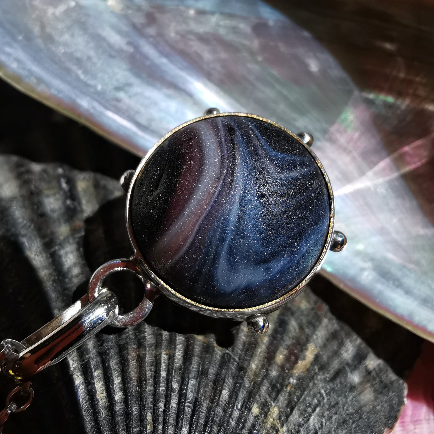 Genuine Scottish purple sea glass marble & sterling silver pendant.