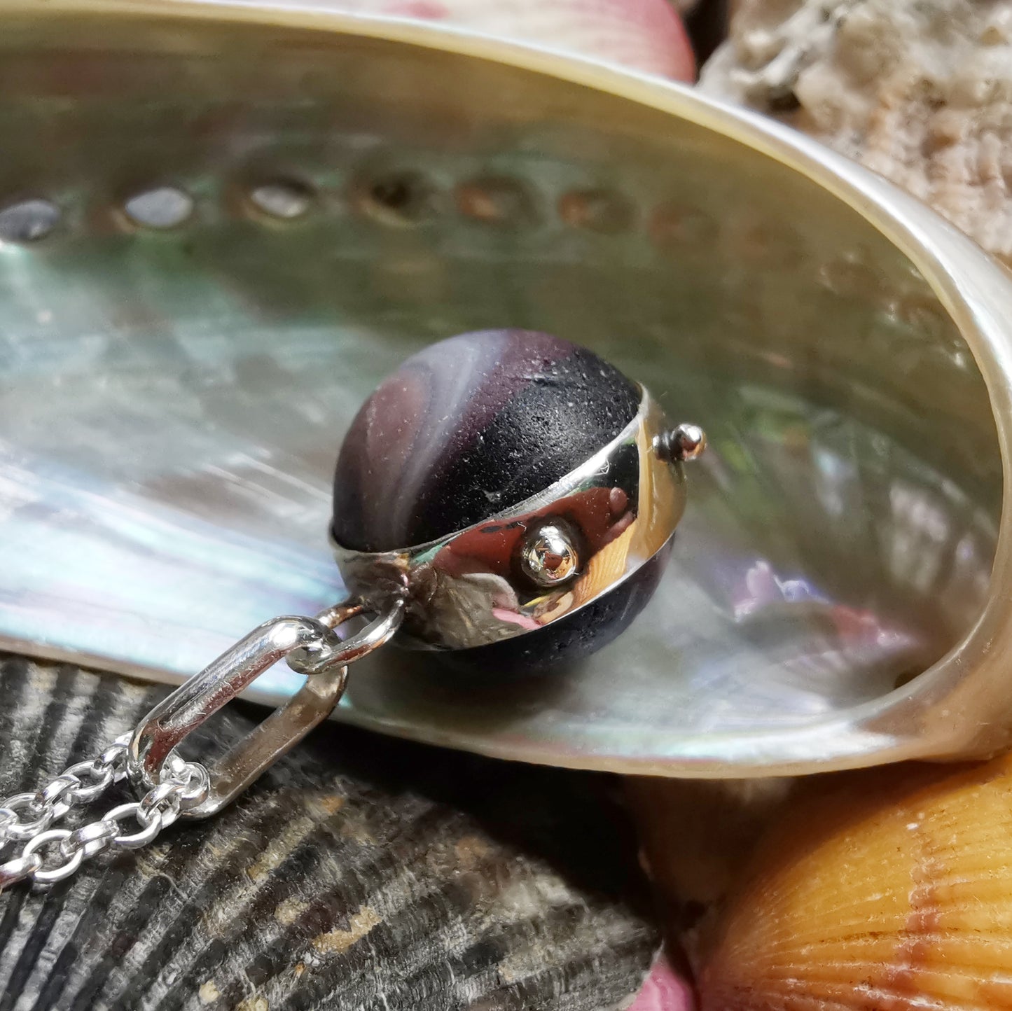 Genuine Scottish purple sea glass marble & sterling silver pendant.