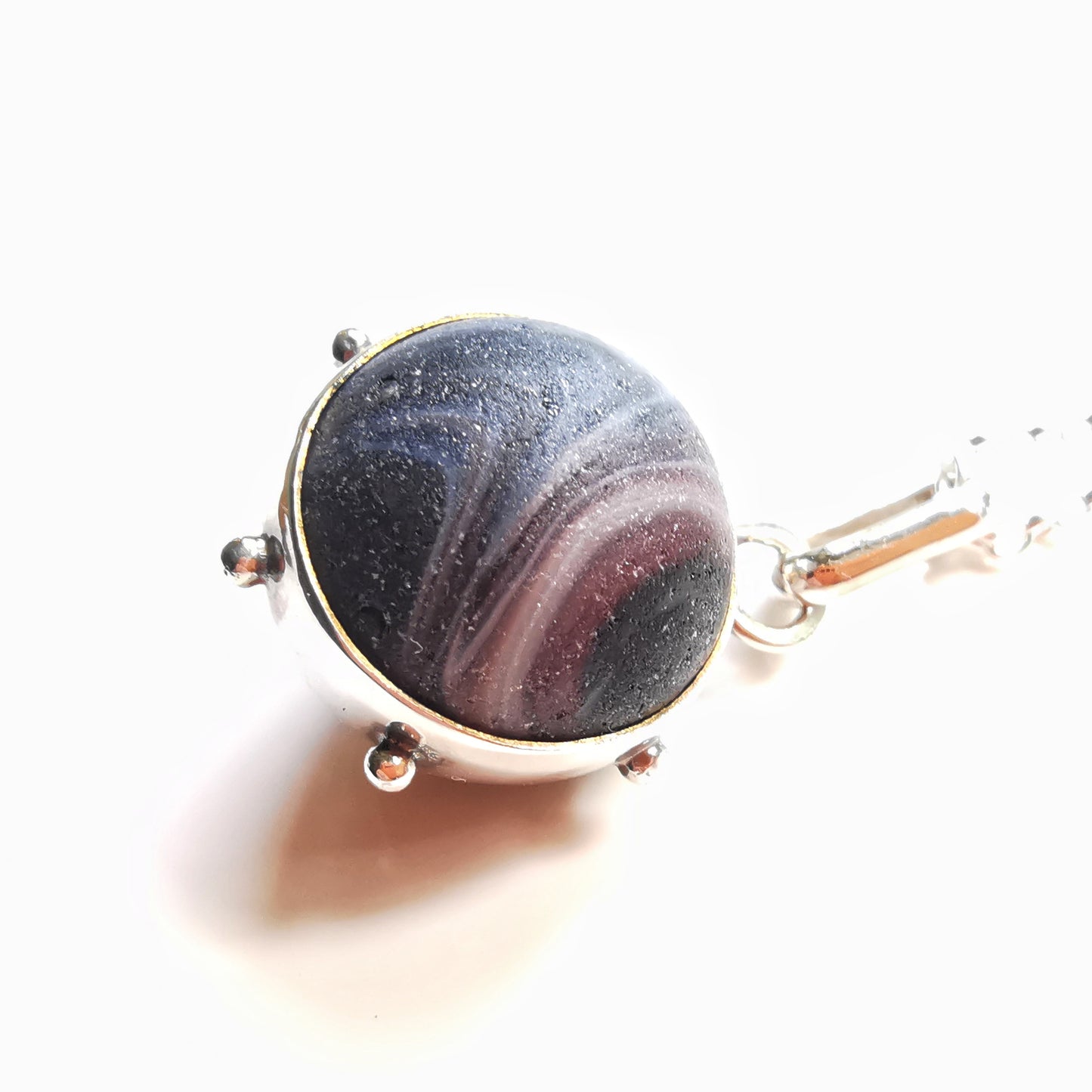 Genuine Scottish purple sea glass marble & sterling silver pendant.