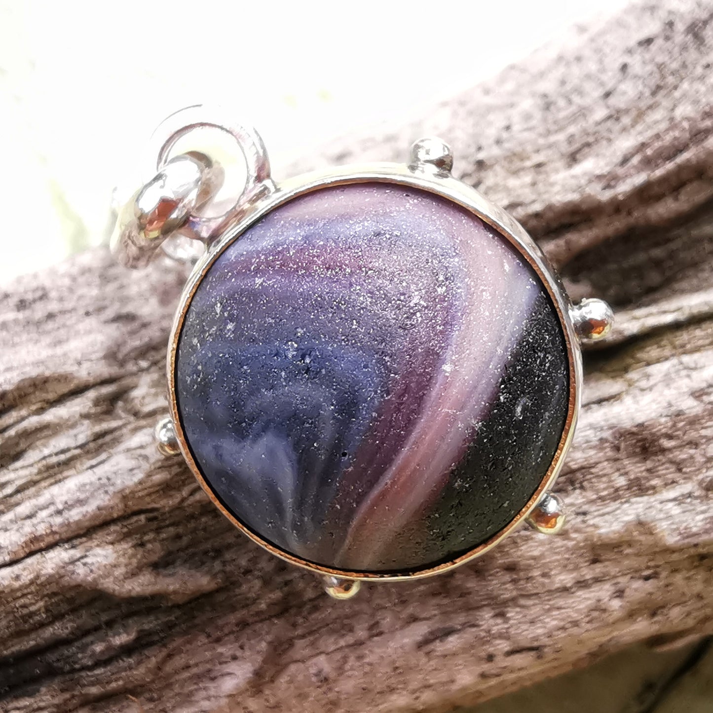 Genuine Scottish purple sea glass marble & sterling silver pendant.