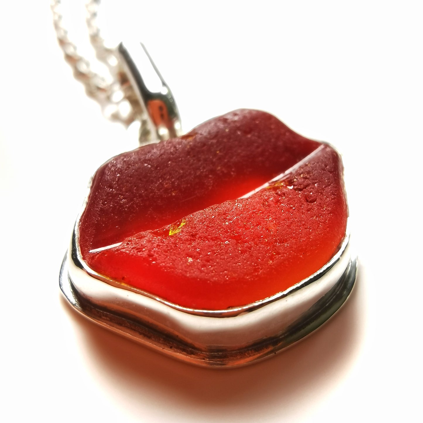 Scottish red and orange lips/kiss sea glass & sterling silver pendant.