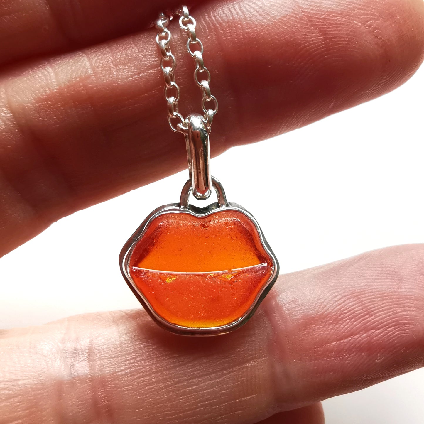 Scottish red and orange lips/kiss sea glass & sterling silver pendant.
