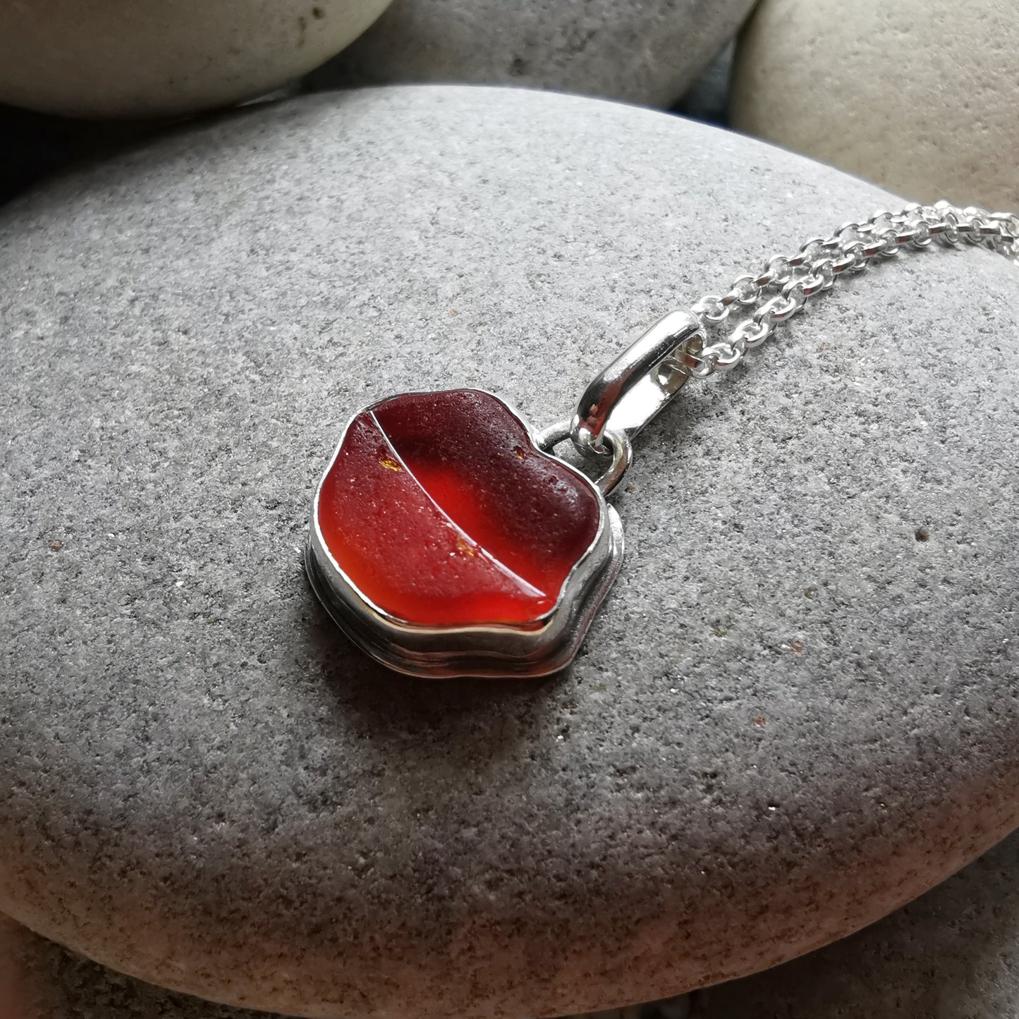 Scottish red and orange lips/kiss sea glass & sterling silver pendant.