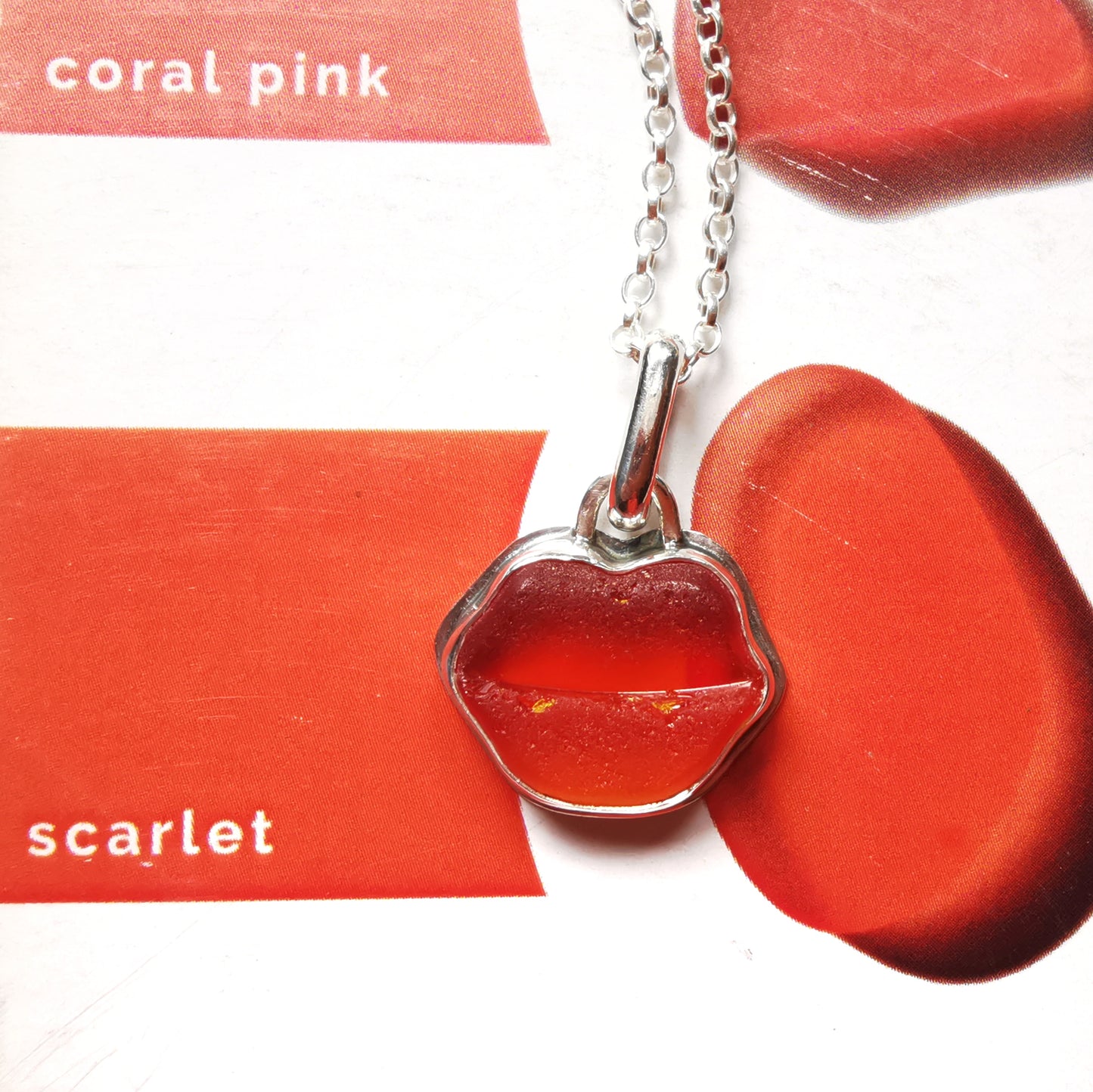 Scottish red and orange lips/kiss sea glass & sterling silver pendant.