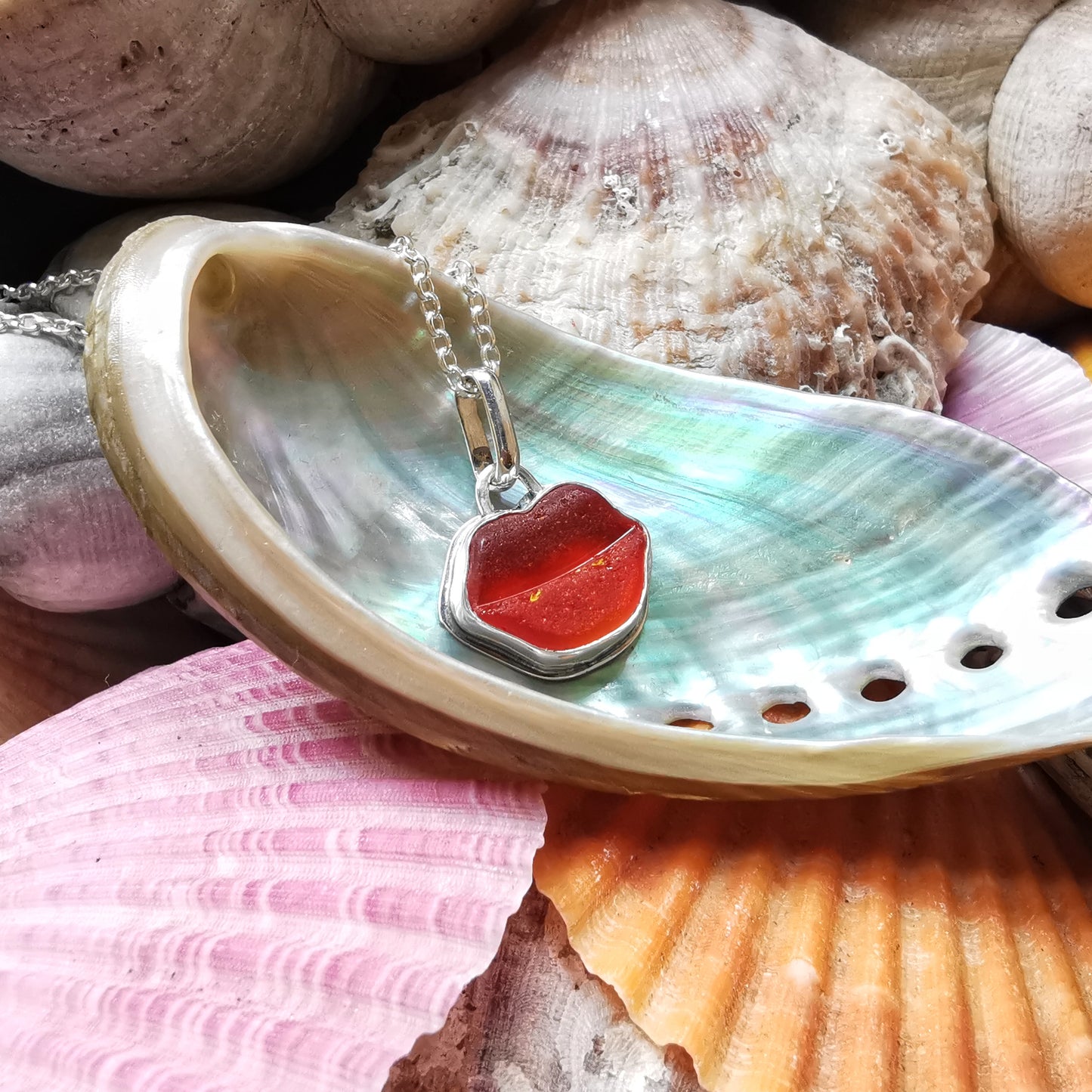 Scottish red and orange lips/kiss sea glass & sterling silver pendant.