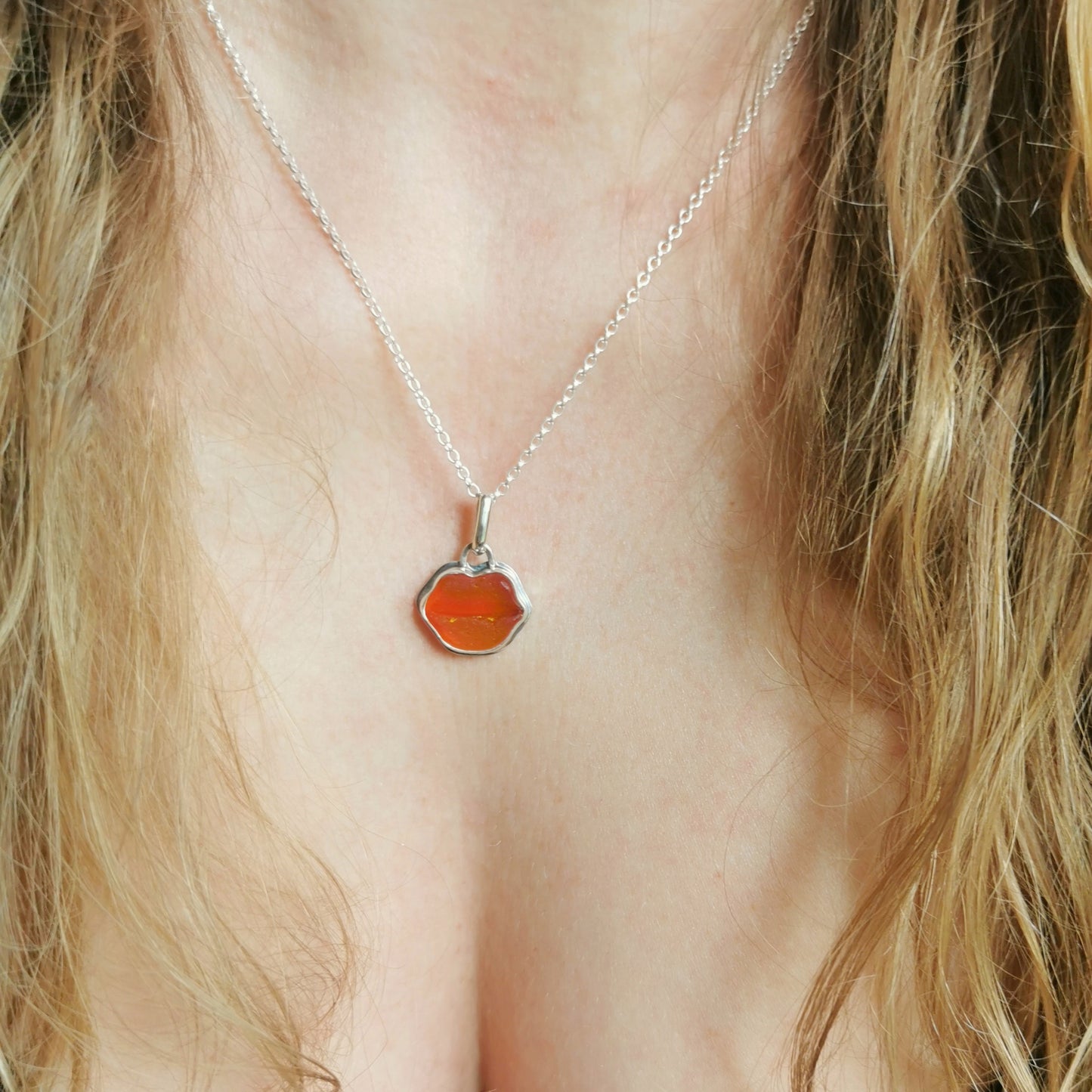 Scottish red and orange lips/kiss sea glass & sterling silver pendant.