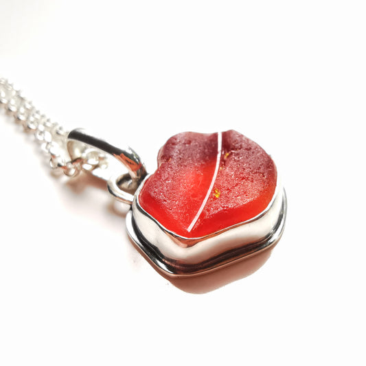 Scottish red and orange lips/kiss sea glass & sterling silver pendant.