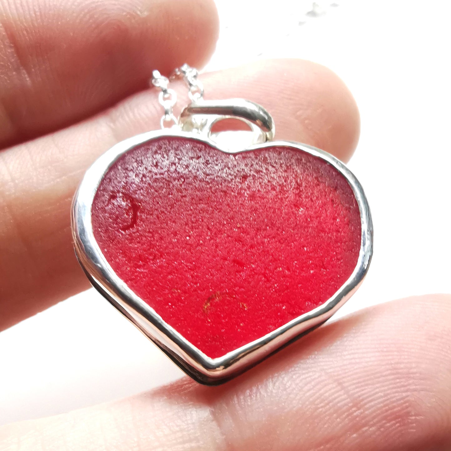 Scottish red UV sea glass heart & sterling silver pendant.