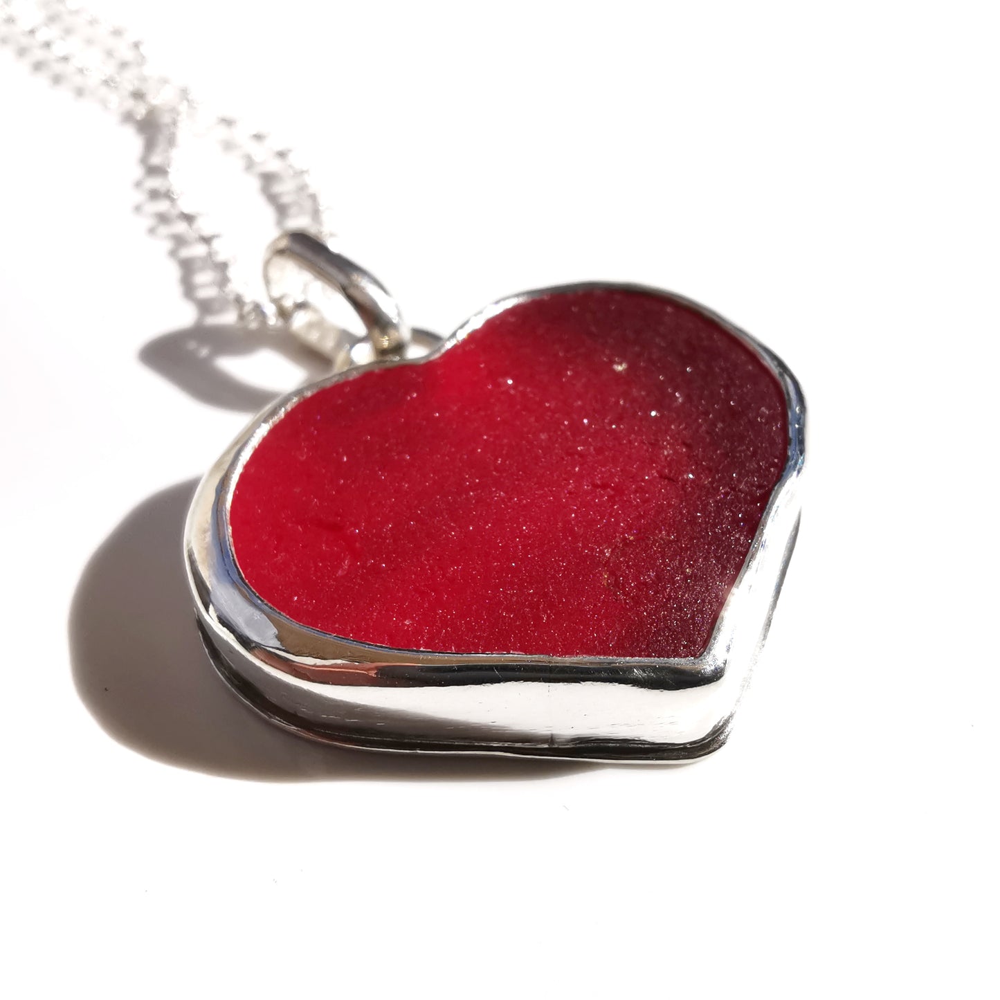 Scottish red UV sea glass heart & sterling silver pendant.