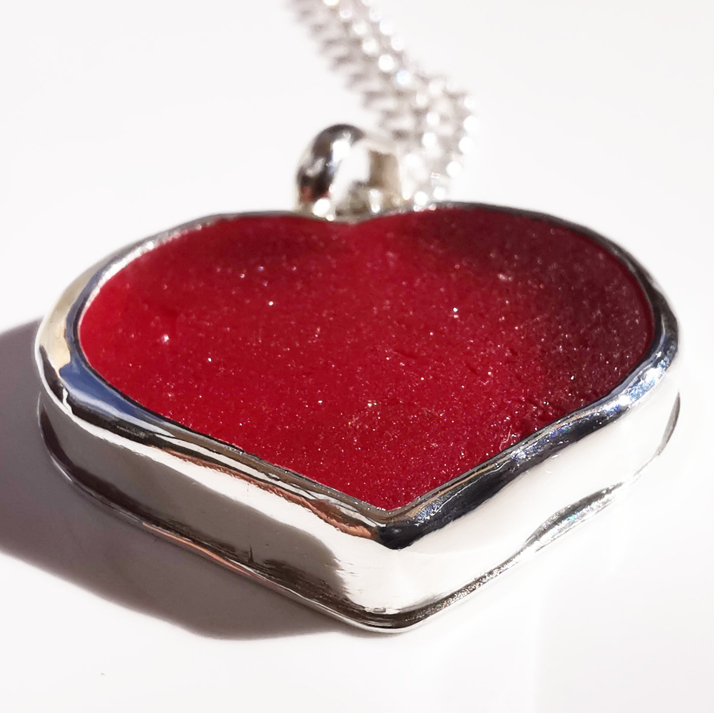 Scottish red UV sea glass heart & sterling silver pendant.