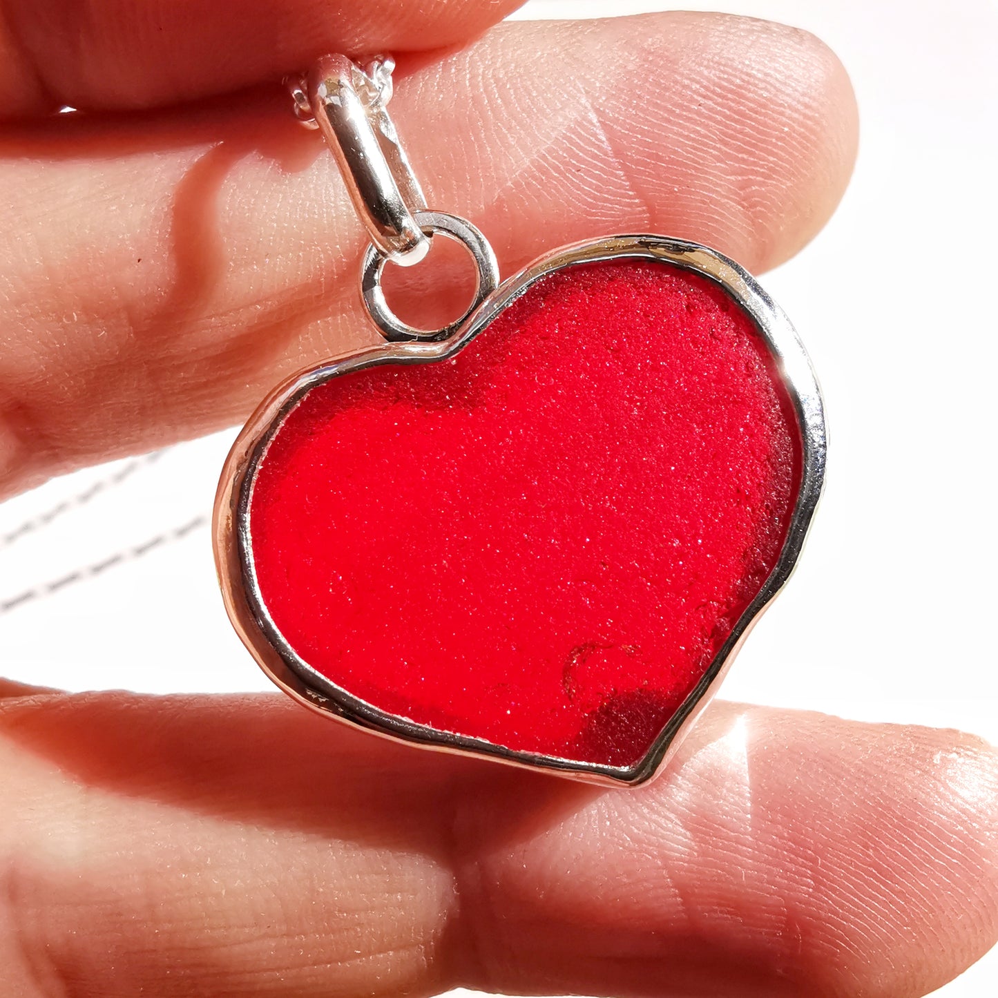 Scottish red UV sea glass heart & sterling silver pendant.