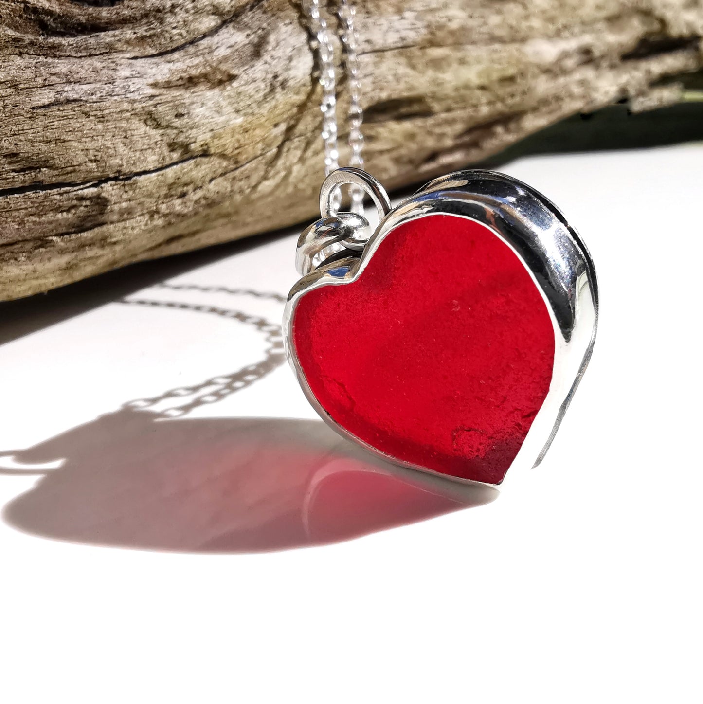 Scottish red UV sea glass heart & sterling silver pendant.