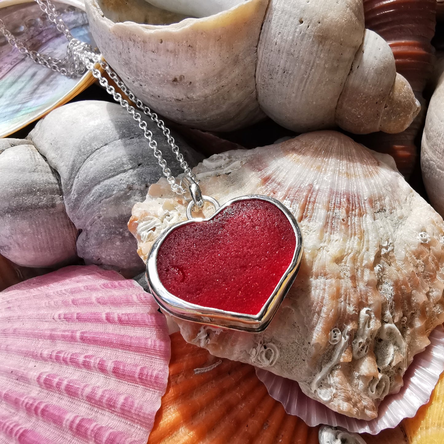 Scottish red UV sea glass heart & sterling silver pendant.