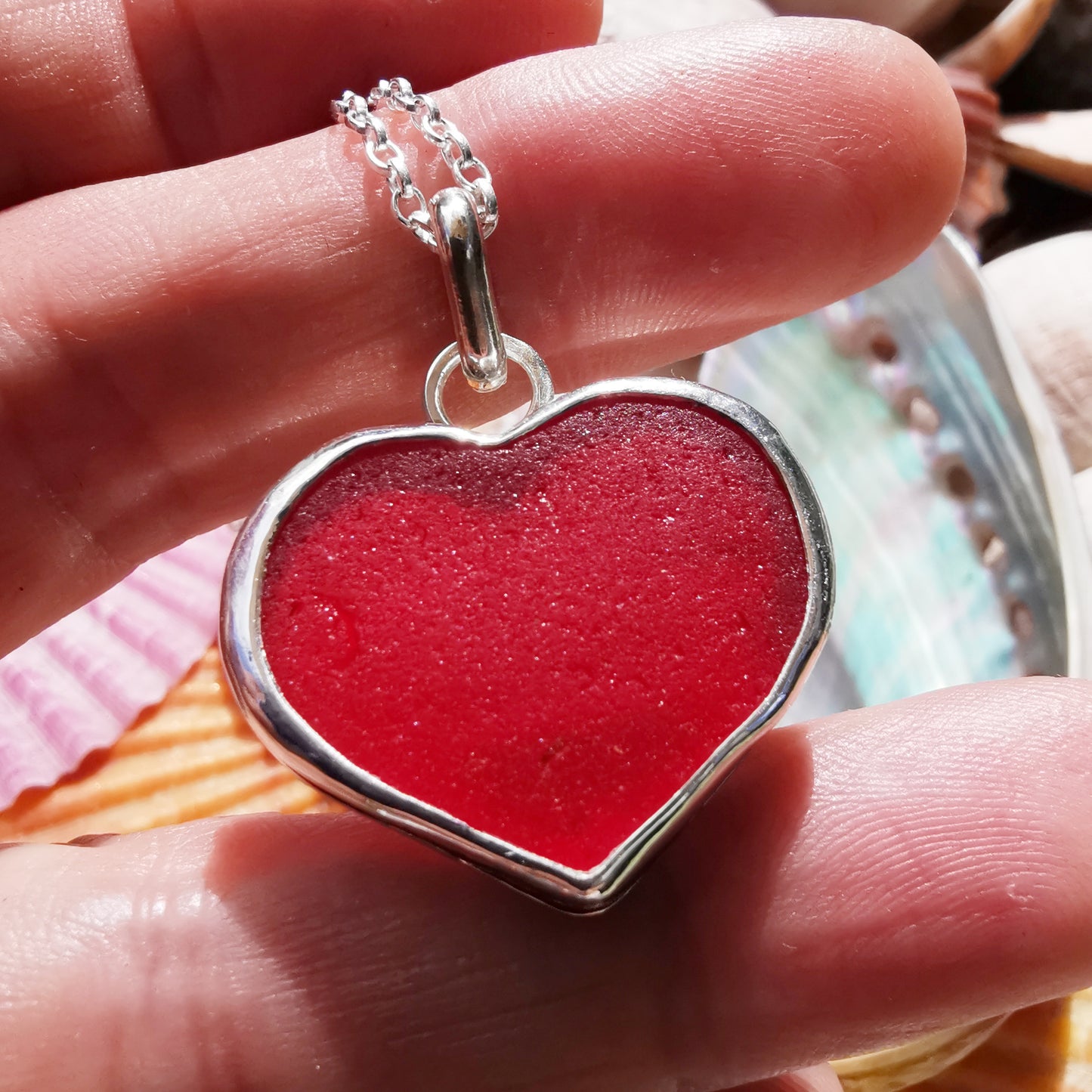 Scottish red UV sea glass heart & sterling silver pendant.
