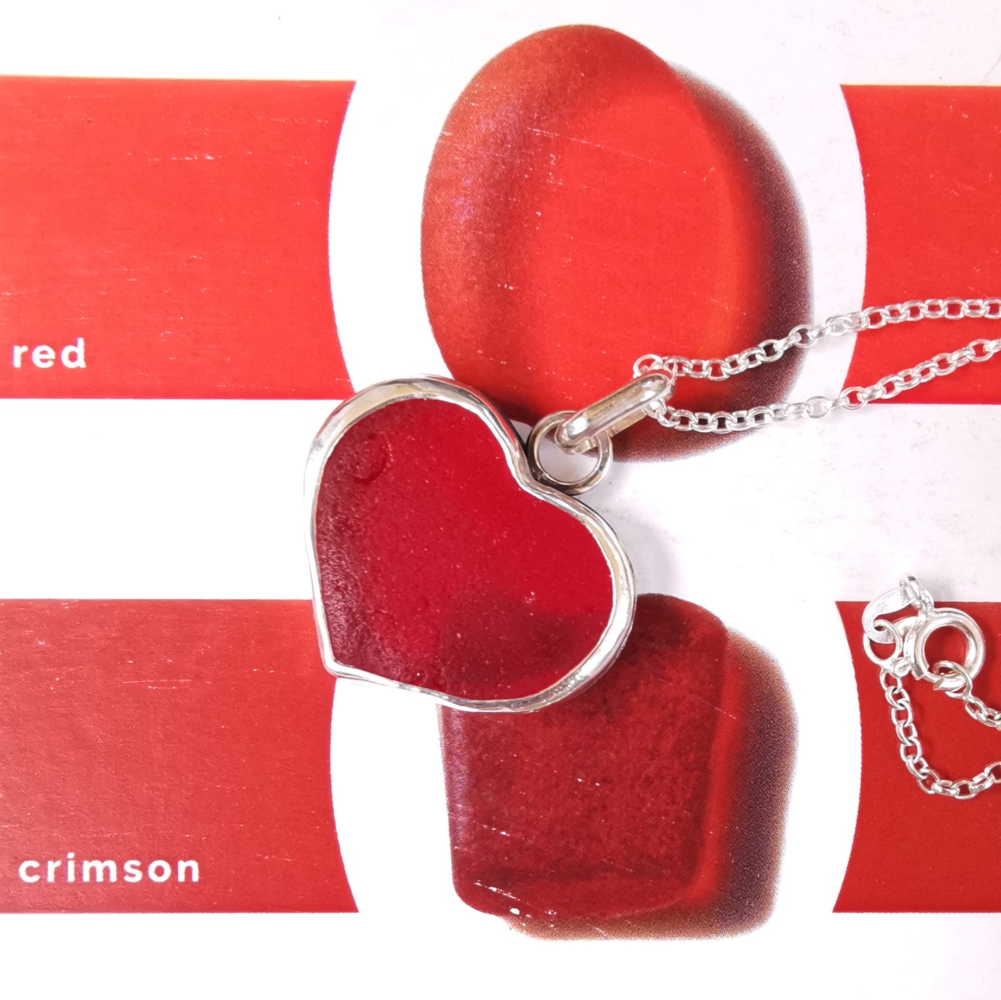 Scottish red UV sea glass heart & sterling silver pendant.