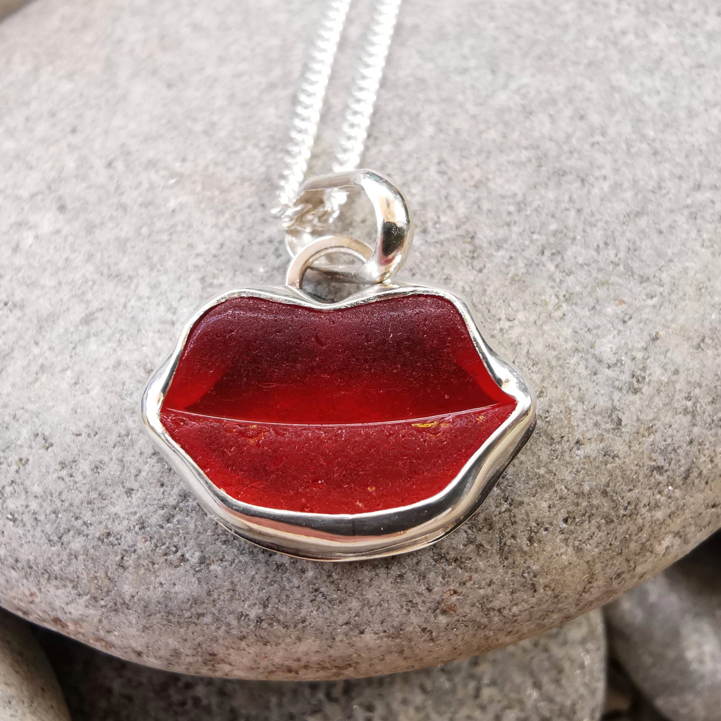 Scottish red  lips/kiss sea glass & sterling silver pendant.
