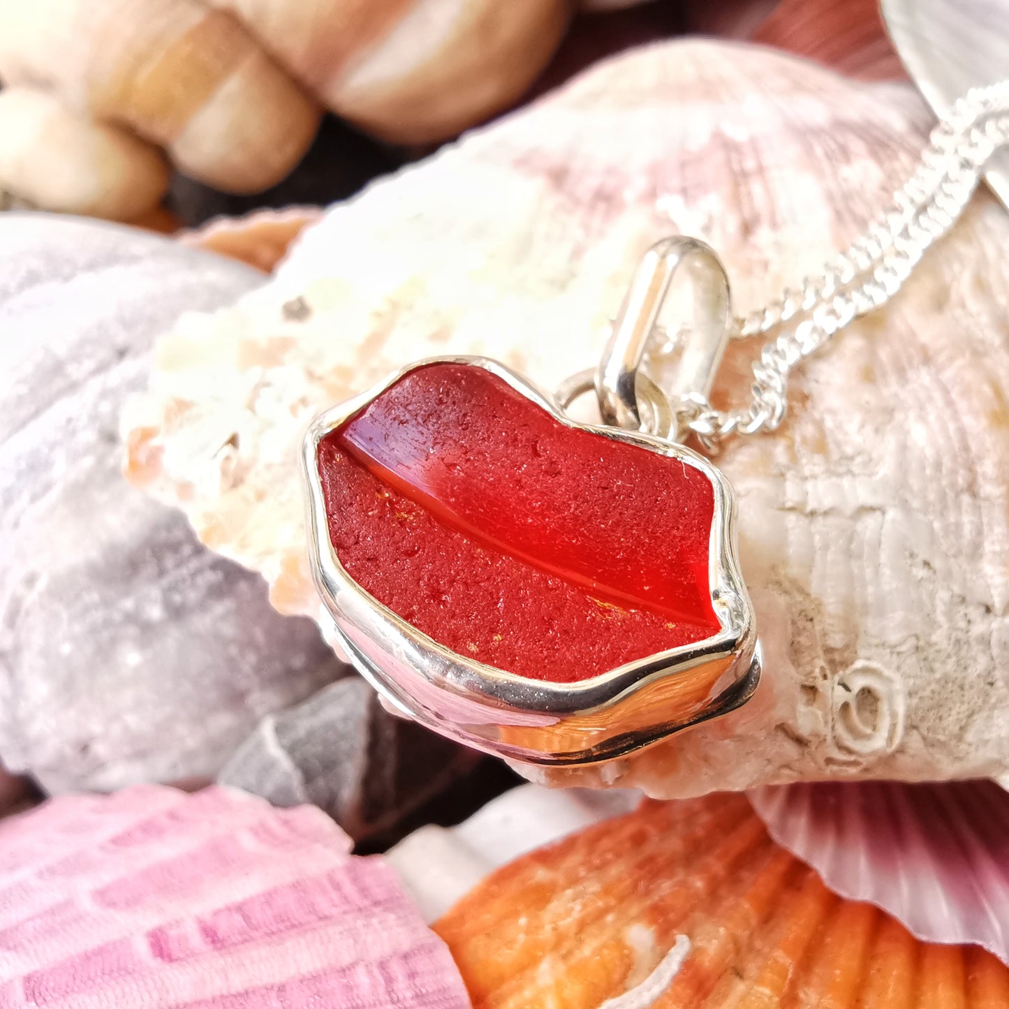 Scottish red  lips/kiss sea glass & sterling silver pendant.