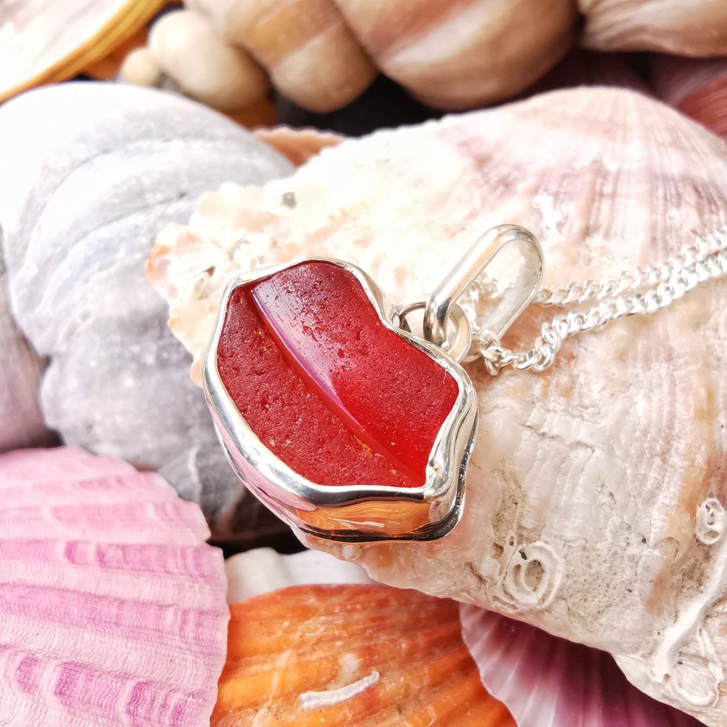 Scottish red  lips/kiss sea glass & sterling silver pendant.