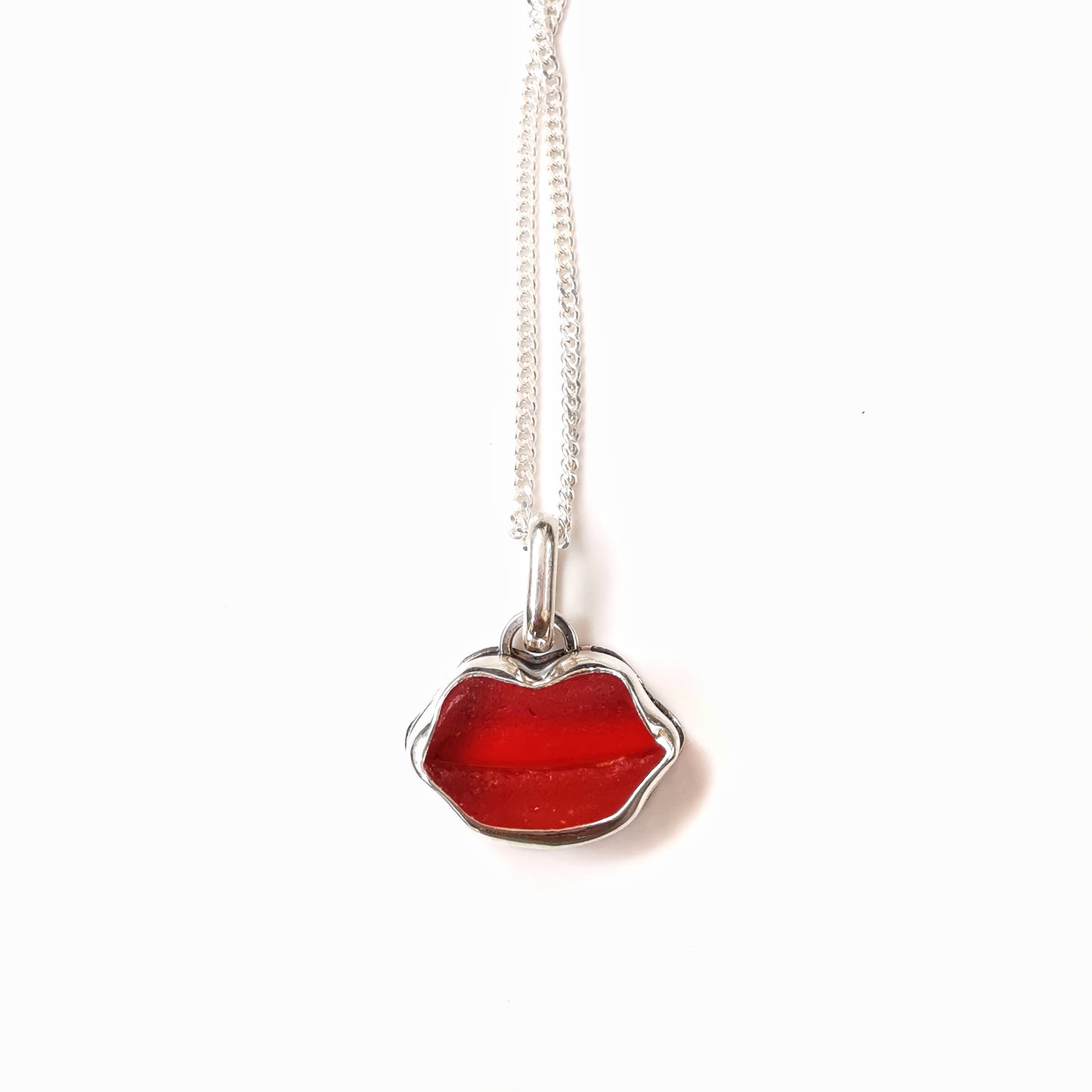 Scottish red  lips/kiss sea glass & sterling silver pendant.