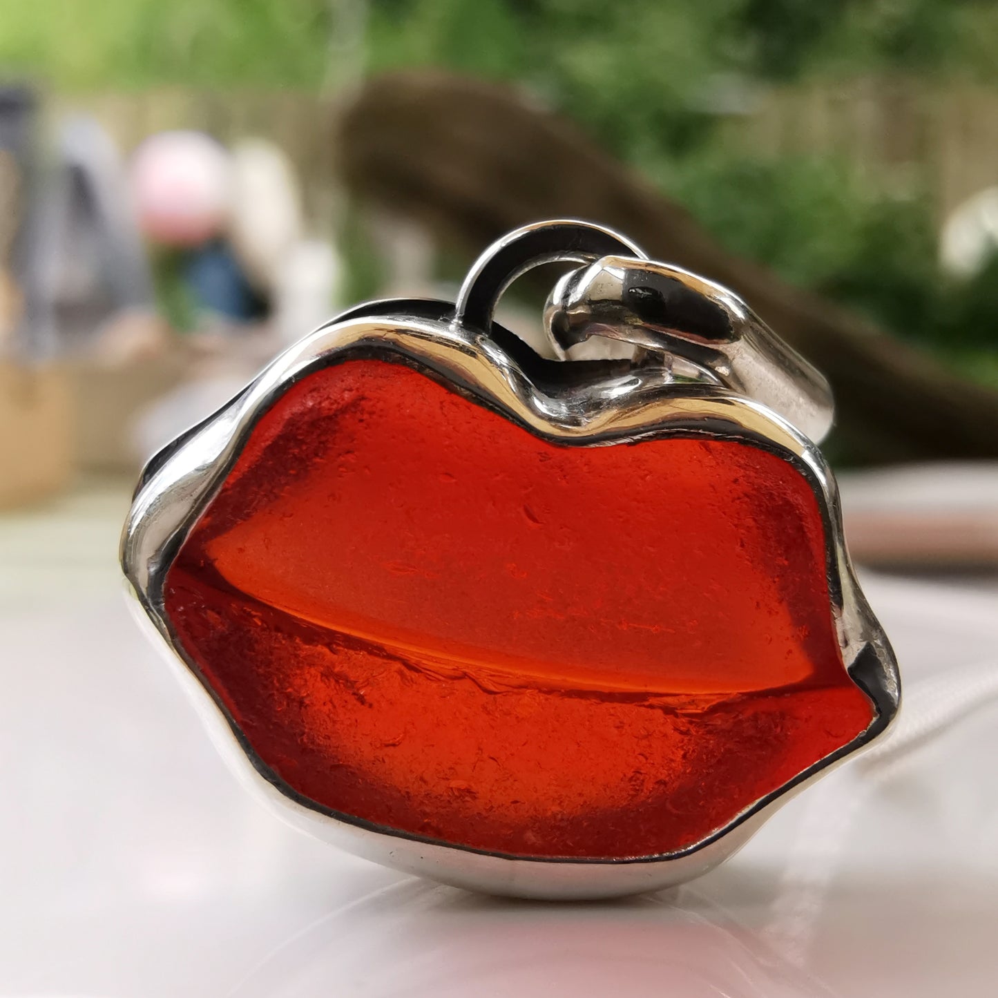Scottish red  lips/kiss sea glass & sterling silver pendant.