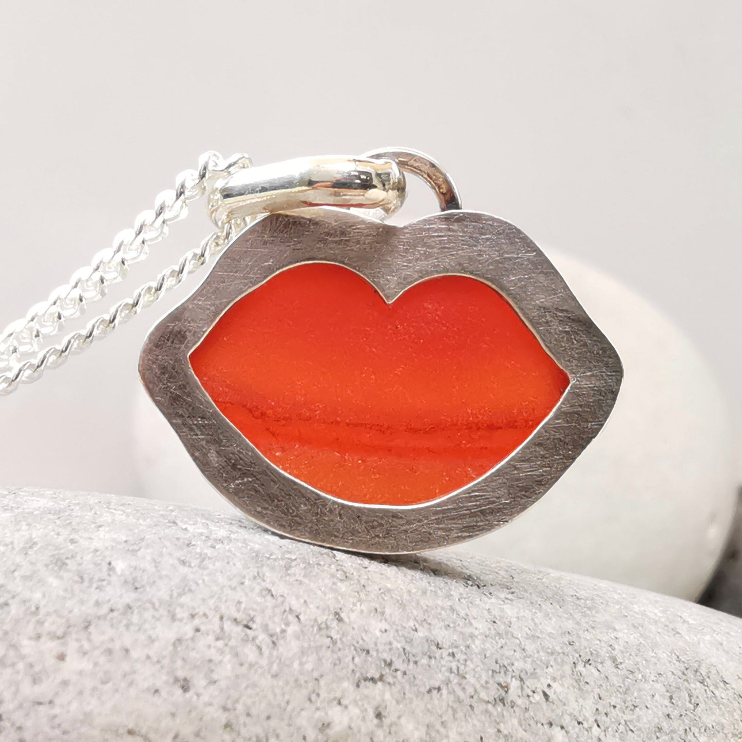Scottish red  lips/kiss sea glass & sterling silver pendant.