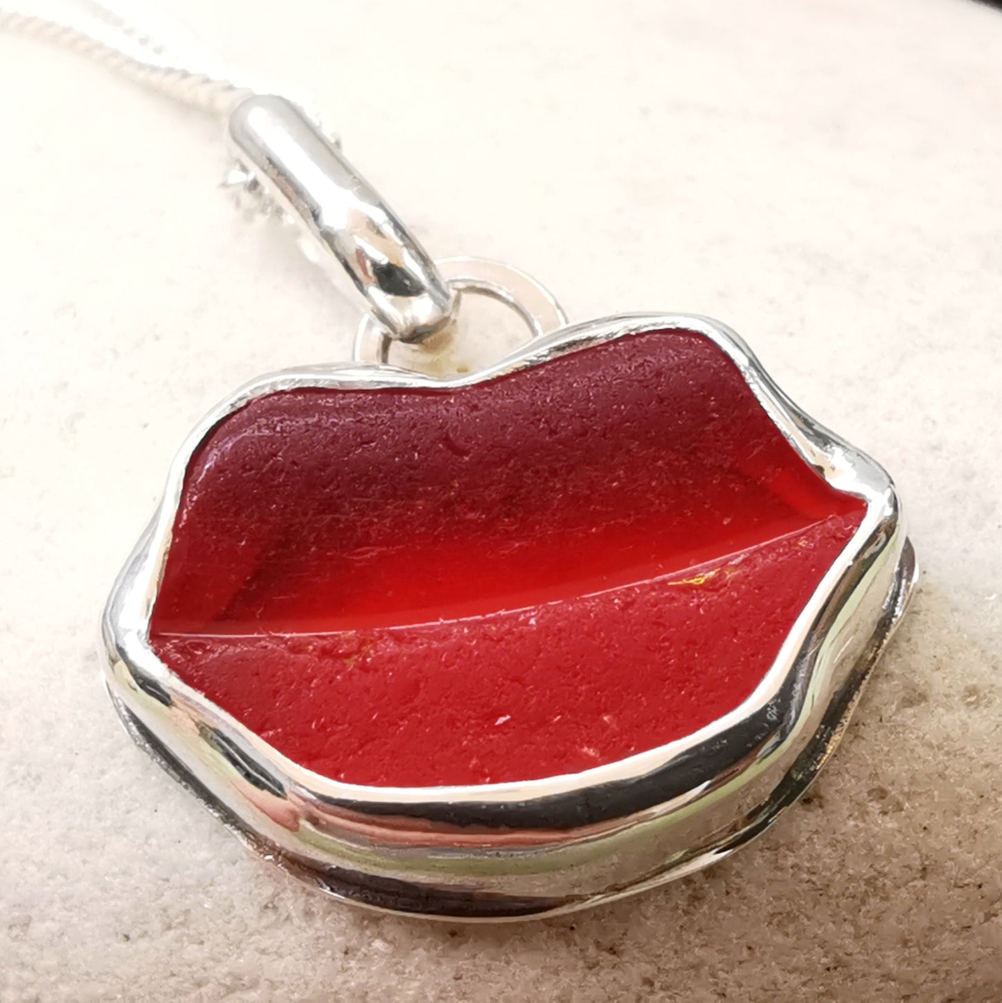 Scottish red  lips/kiss sea glass & sterling silver pendant.