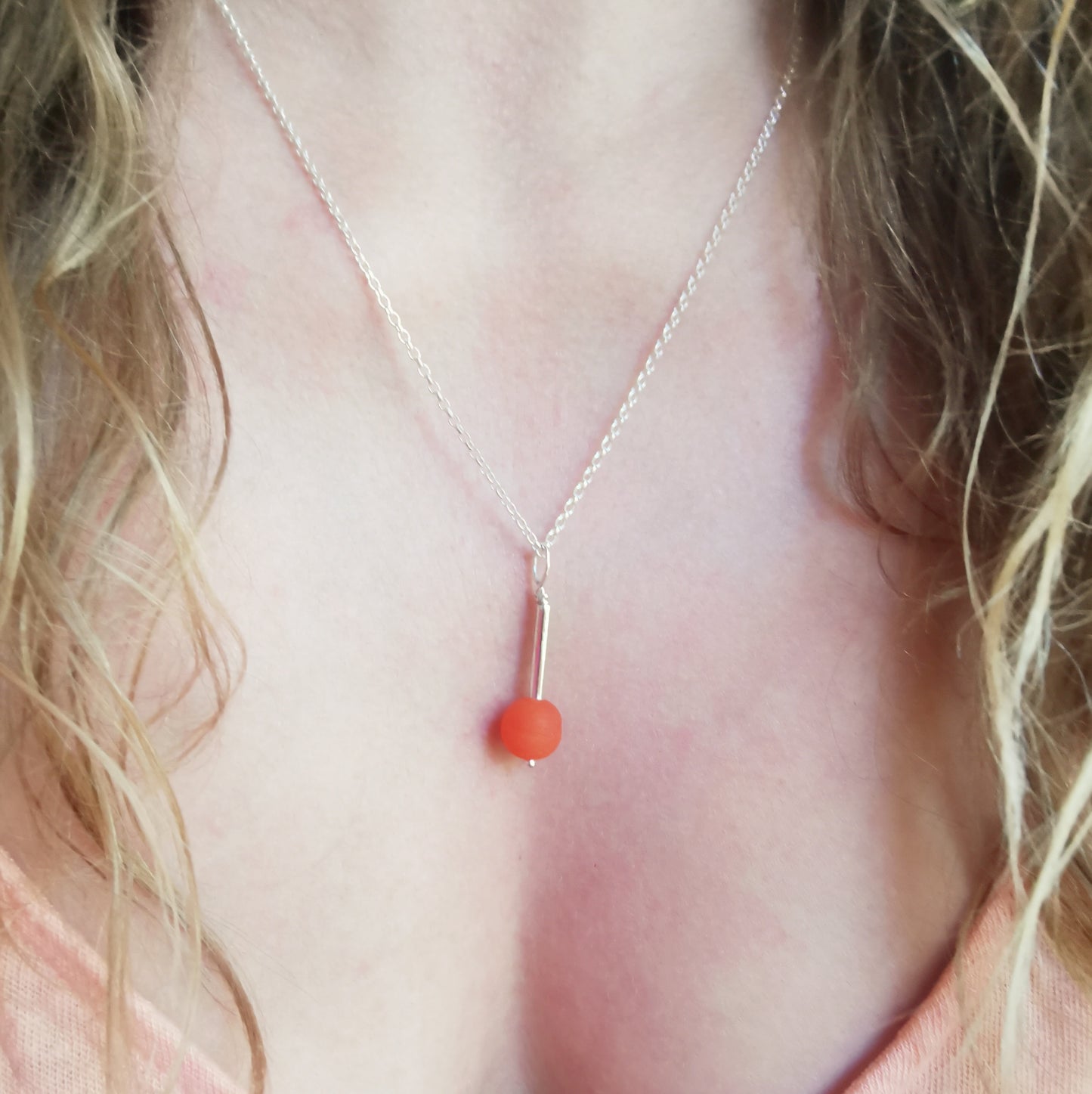 Scottish orange sea glass bead & sterling silver pendant.