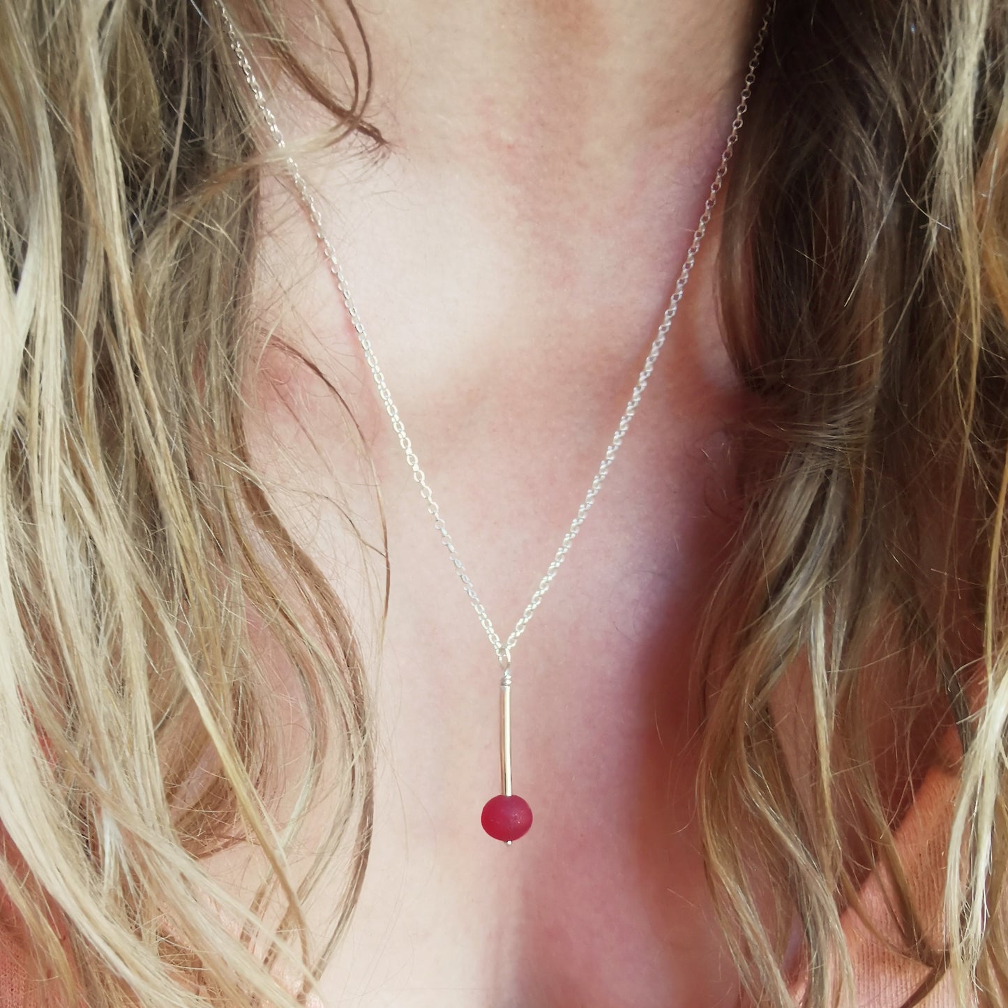 Scottish red sea glass bead & sterling silver pendant.