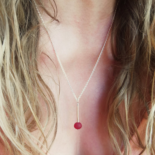 Scottish red sea glass bead & sterling silver pendant.