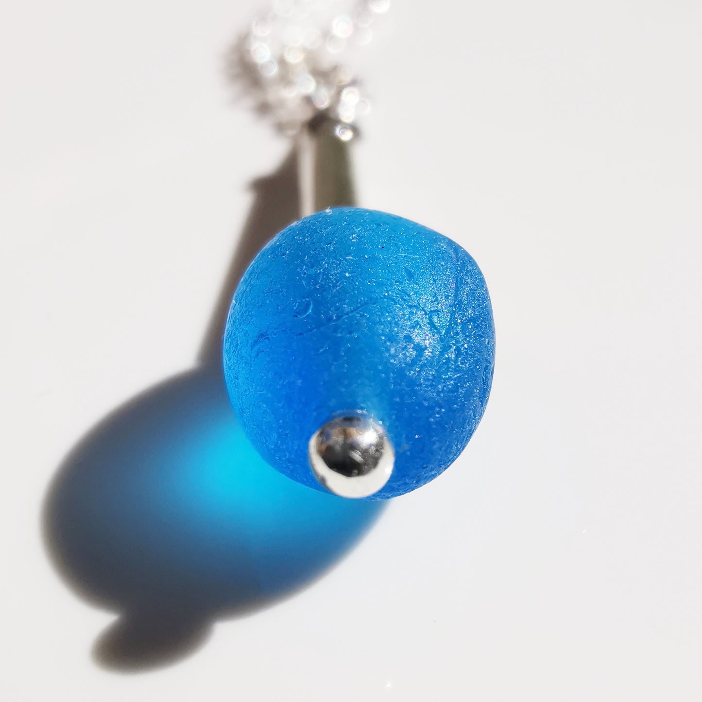 Scottish electric blue sea glass bead & sterling silver pendant.