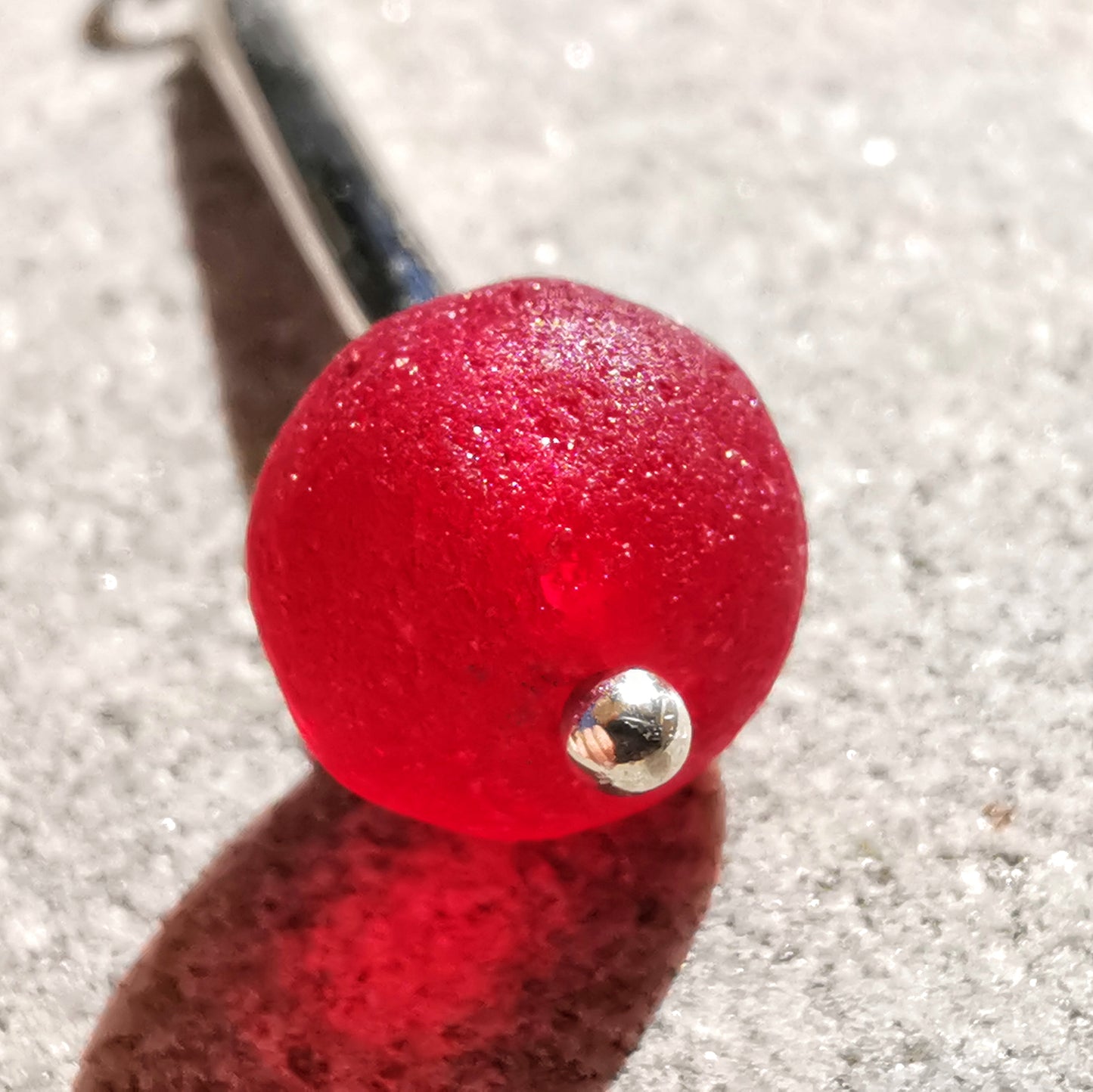 Scottish red sea glass bead & sterling silver pendant.