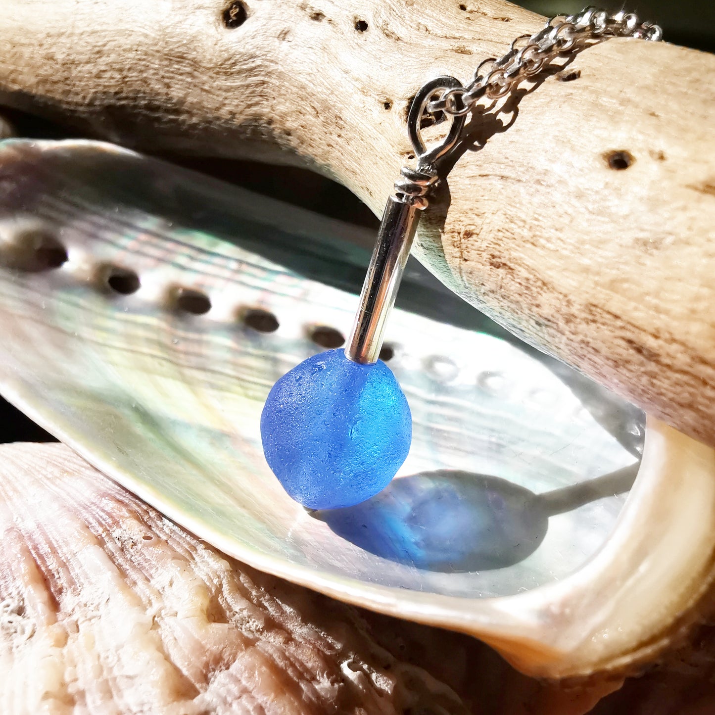 Scottish blue sea glass bead & sterling silver pendant.