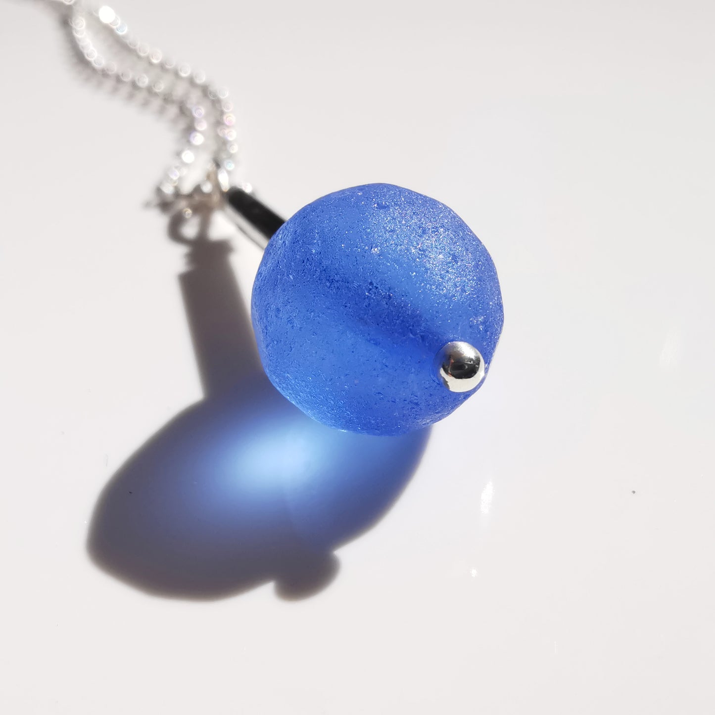 Scottish blue sea glass bead & sterling silver pendant.