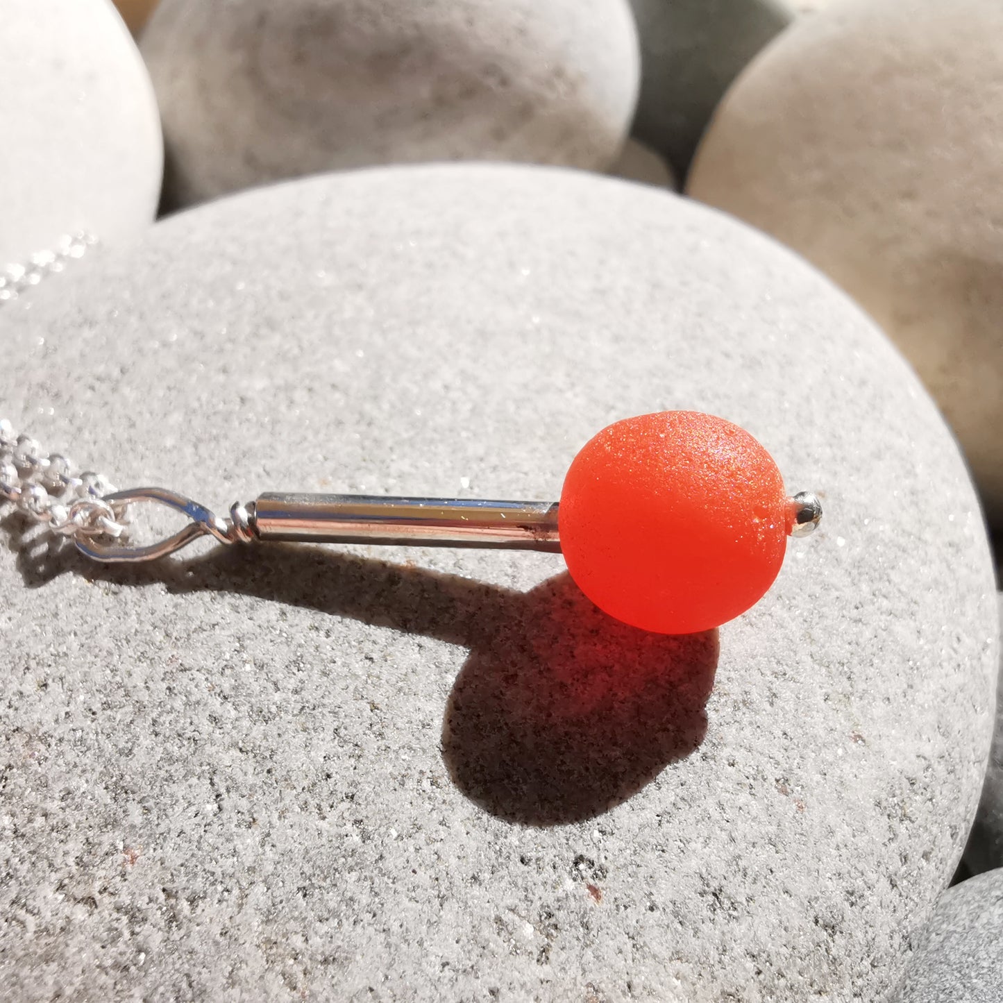 Scottish orange sea glass bead & sterling silver pendant.