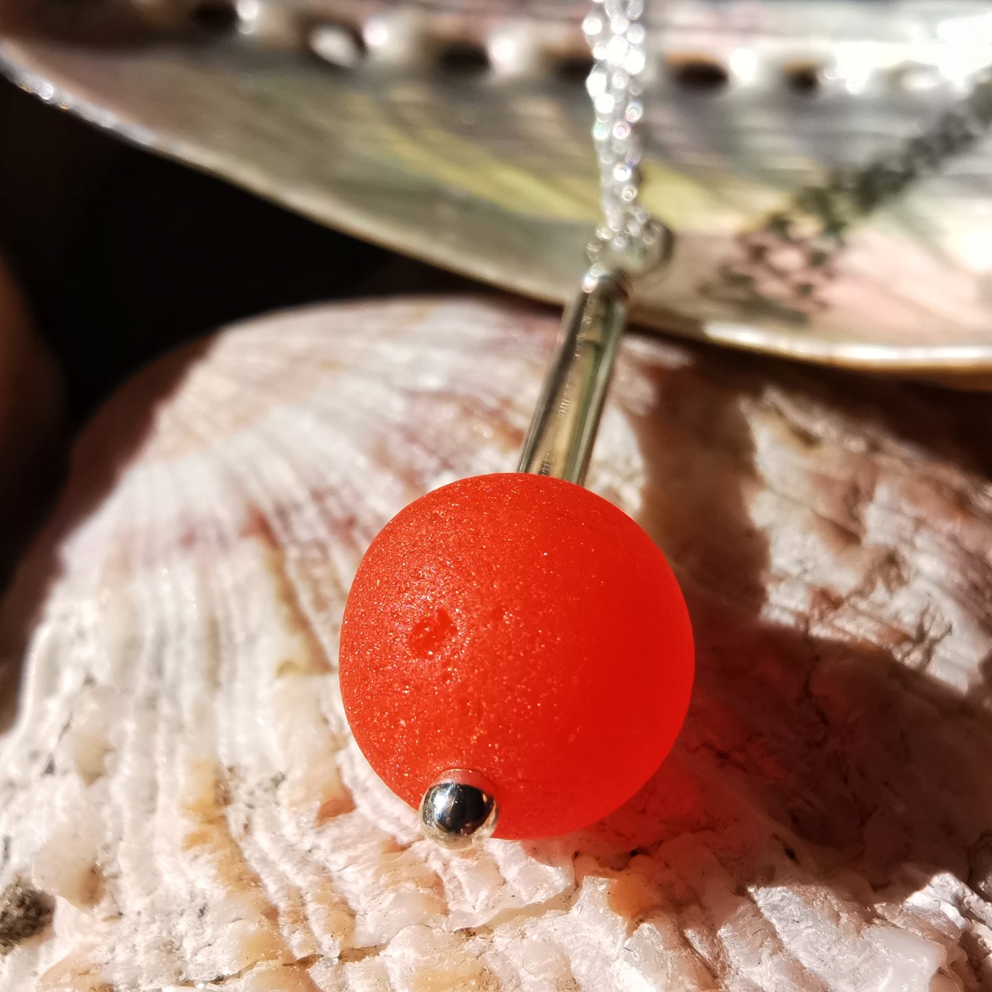 Scottish orange sea glass bead & sterling silver pendant.